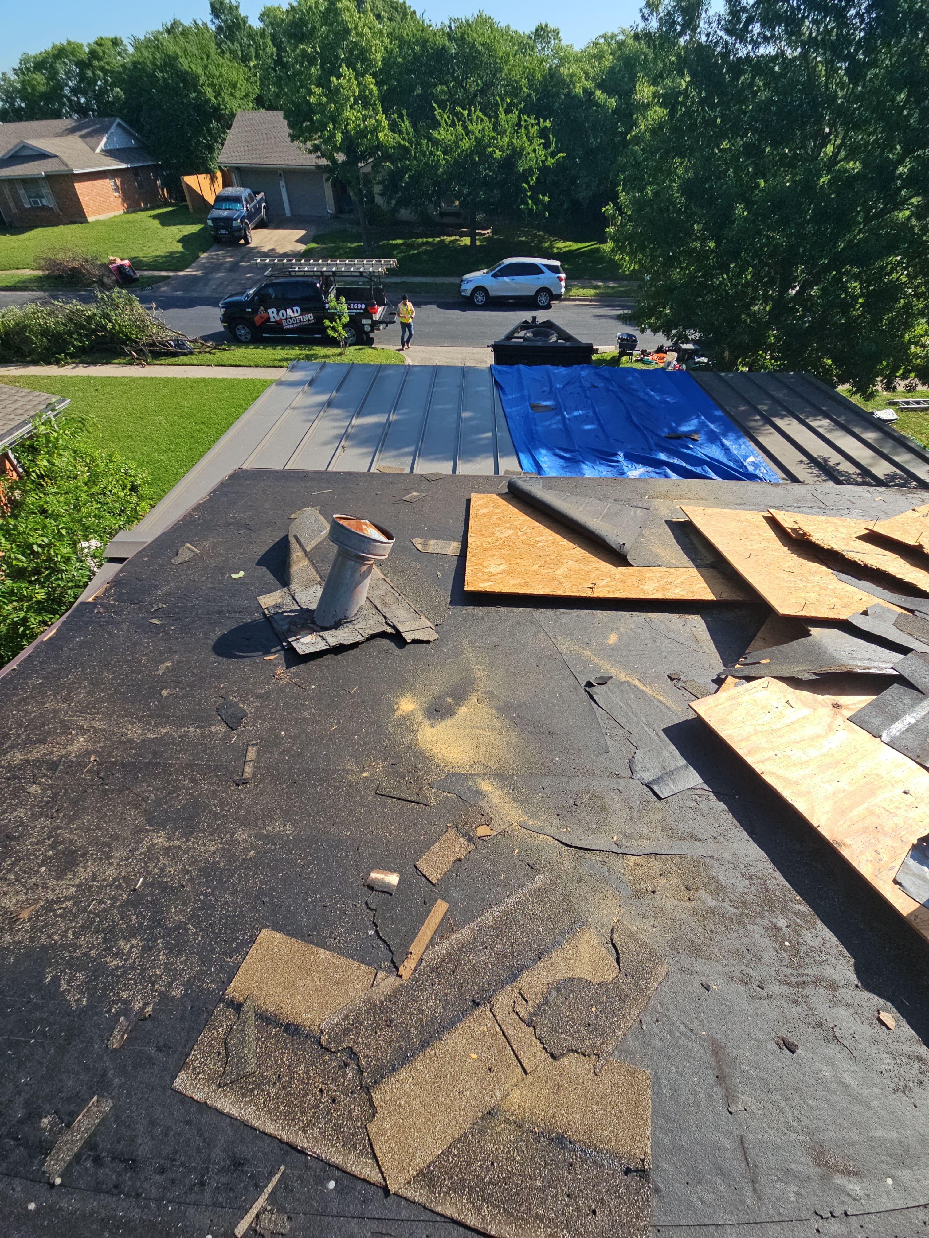 Roof Replacement in Garland TX. by road roofing llc