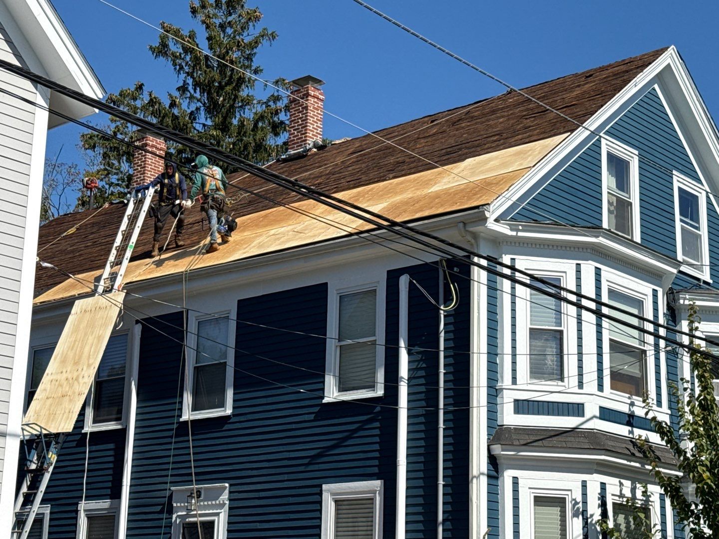 Half Roof Replacement for Solar Installation – Townhouse with New Plywood Decking by Sensible Home Solutions