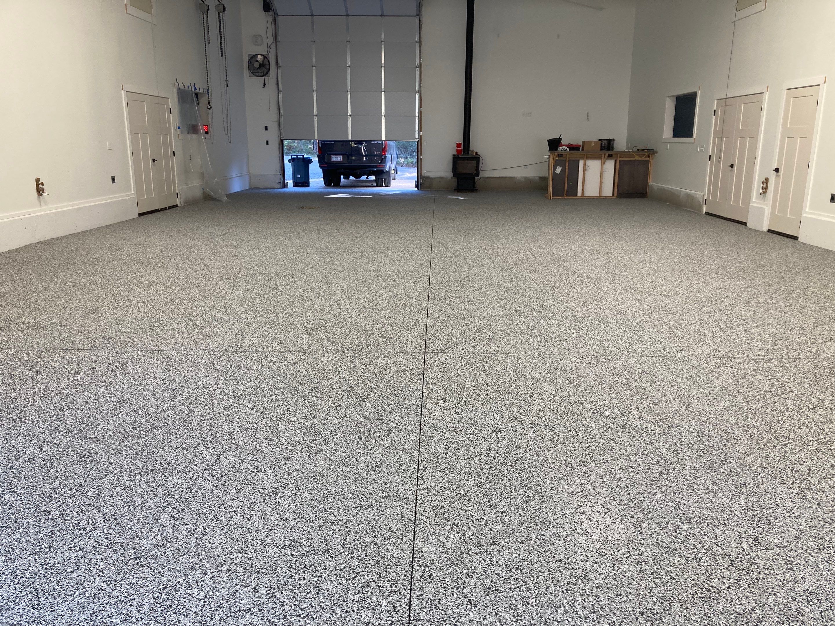 Garage Transformation using Domino and the Penntek Evolution System by Croc Coatings, LLC