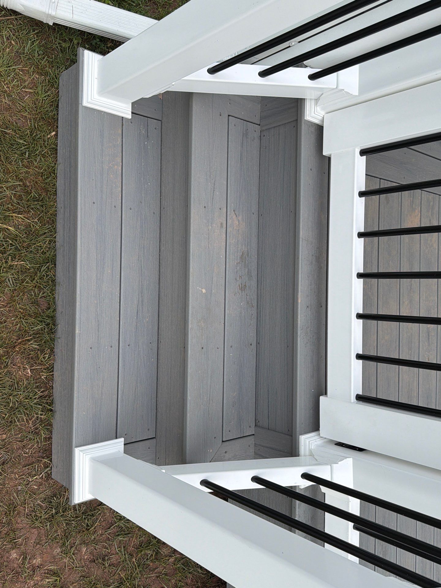 Custom Gray Composite Deck Installation in Duncannon by Esh Builders