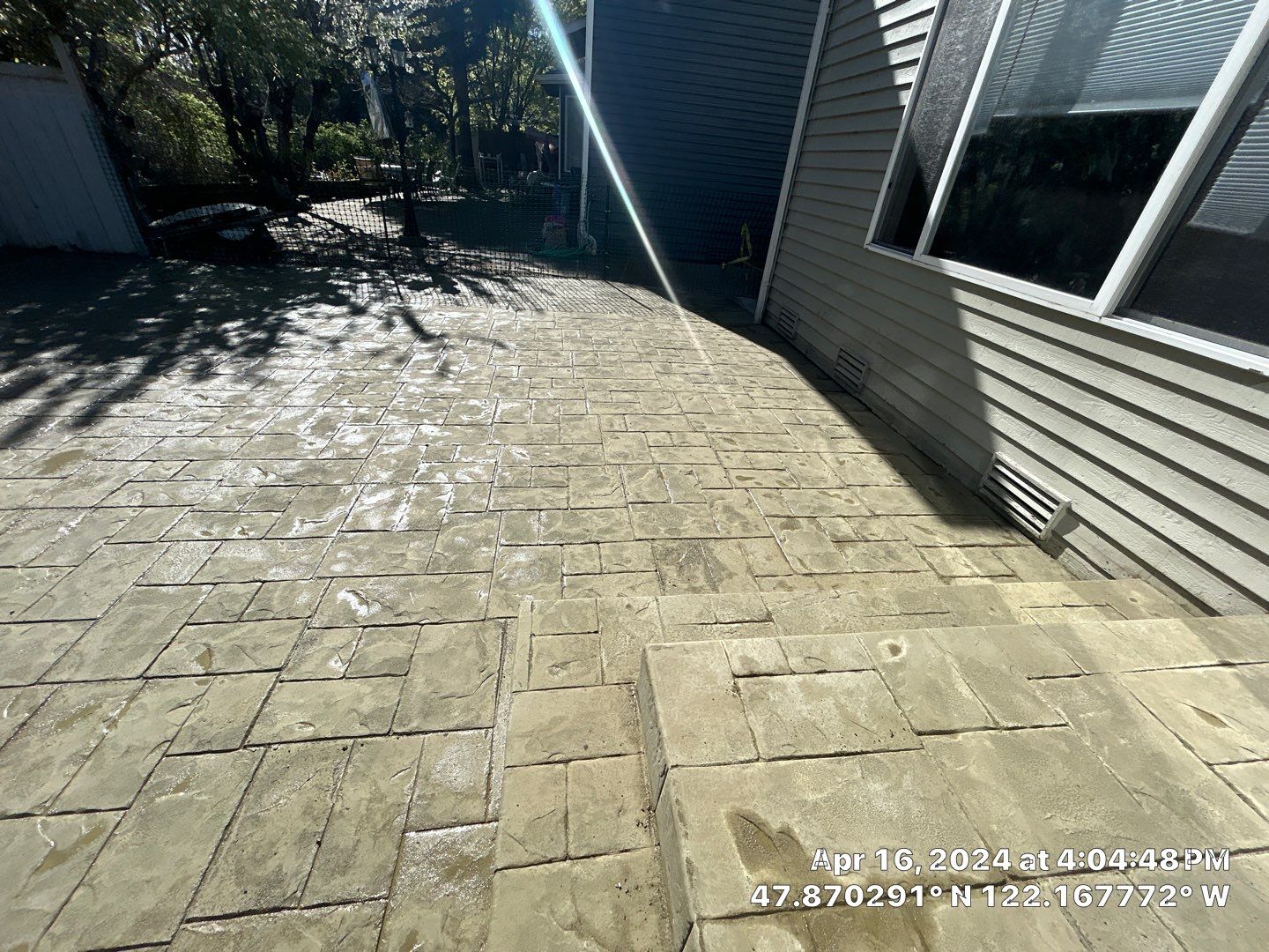 Benedict | Stamped Concrete Back Patio by Jireh Asphalt & Concrete Inc 