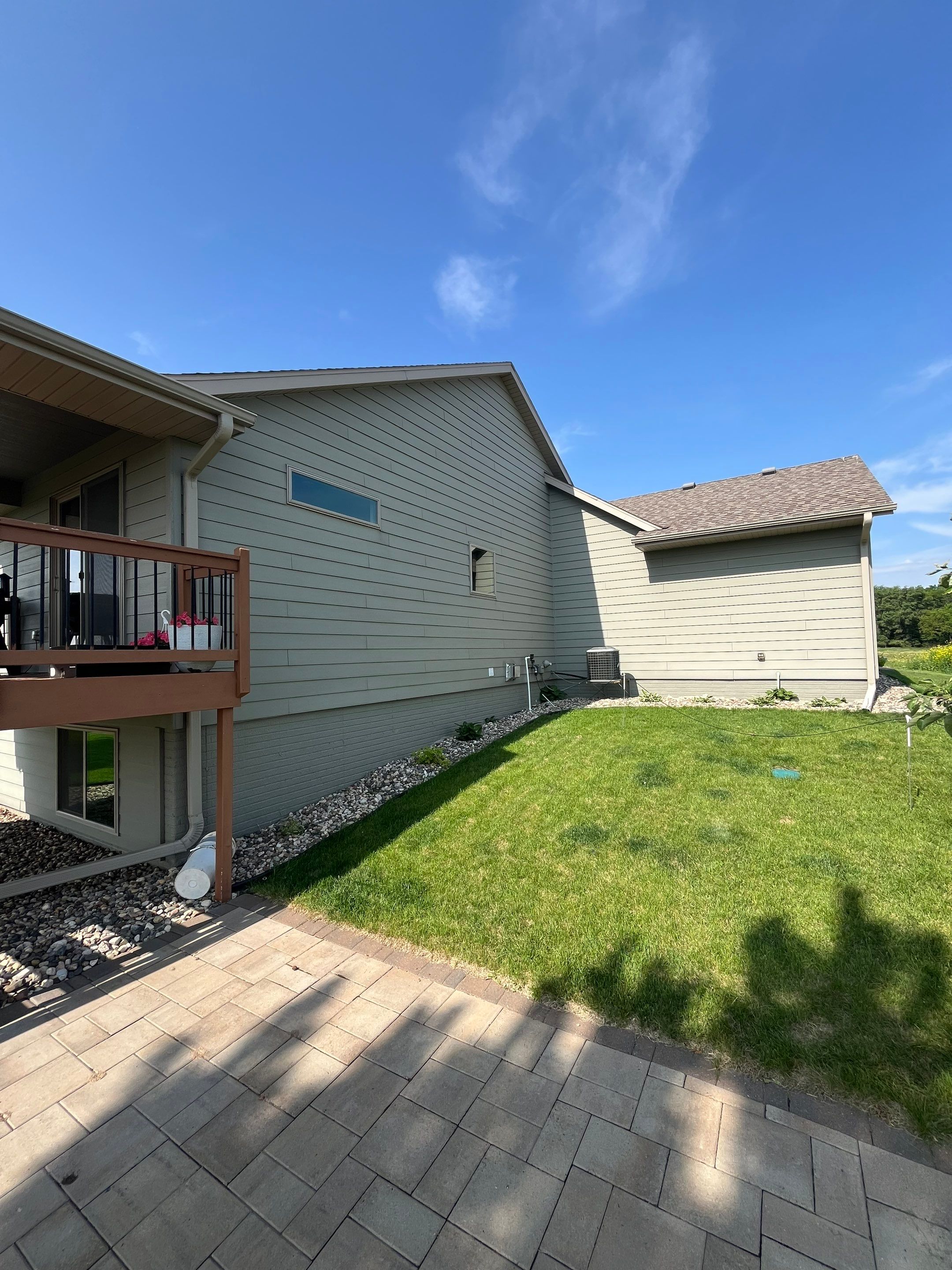 Sioux Falls Residential Exterior Refresh with Fiber Cement Siding by Select Painting, Coatings & Garage Cabinets