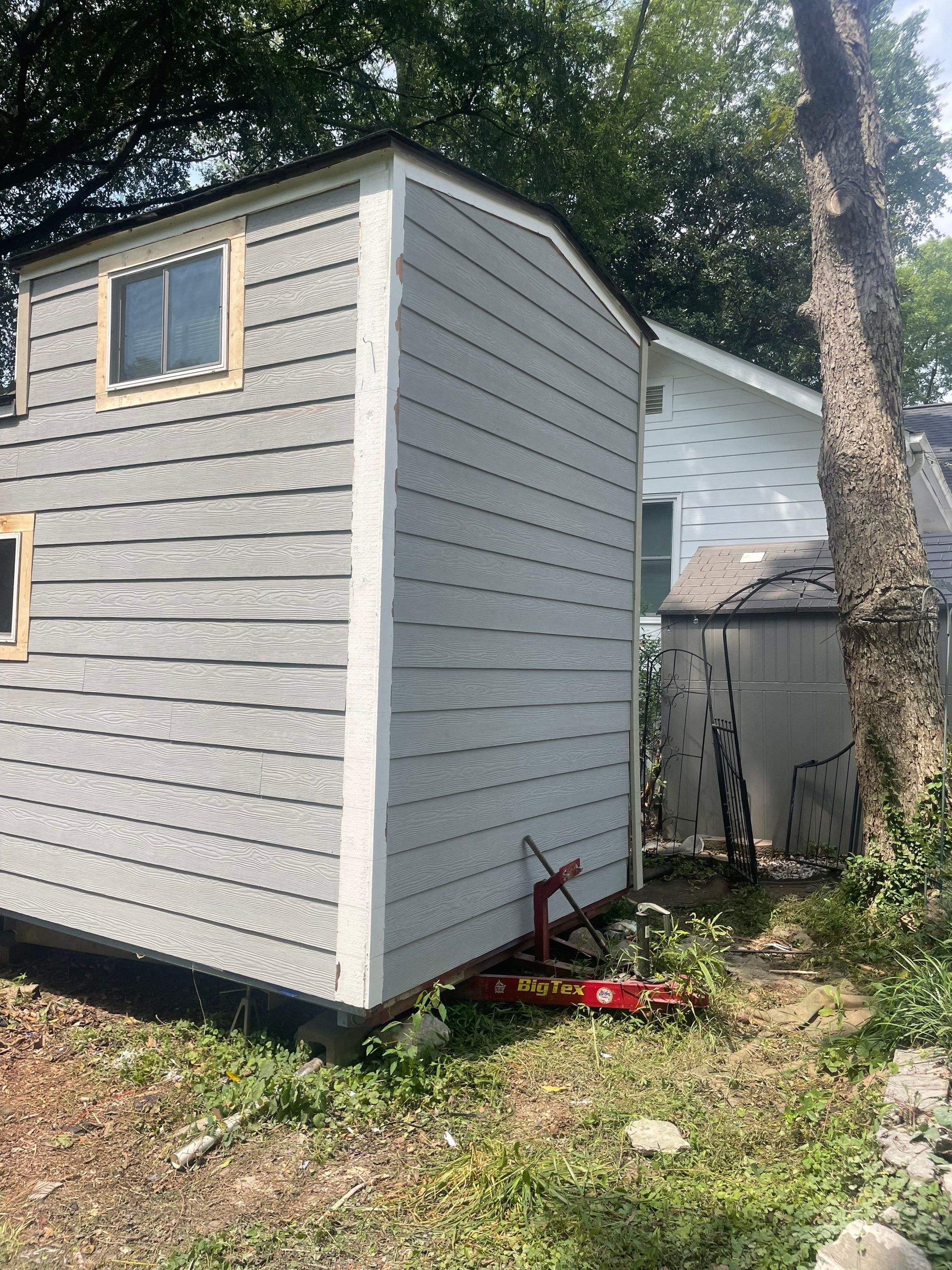 tiny home remodel- siding,paint,roofing by Nailed It Roofing & Remodeling LLC