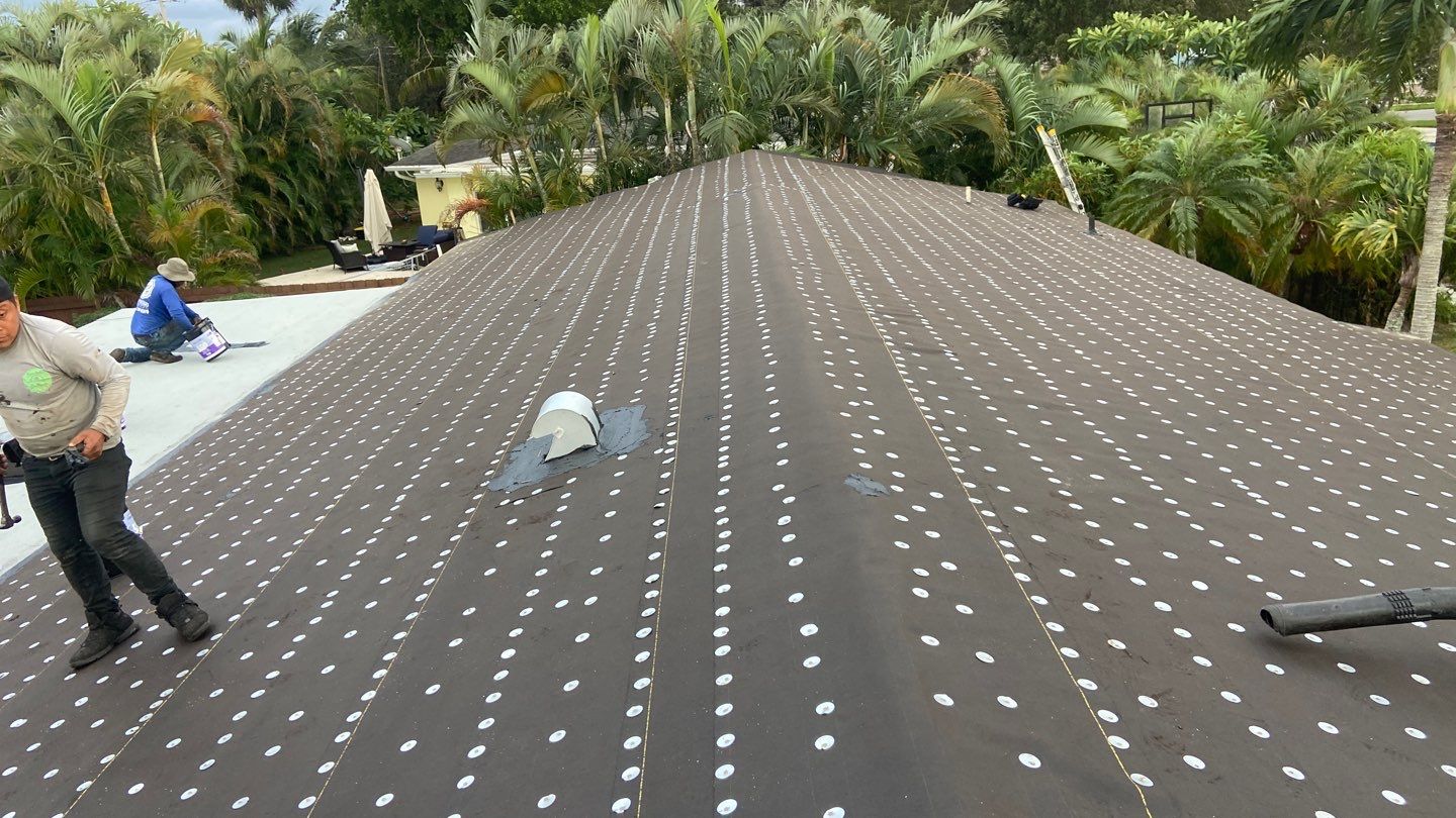 Residential Roofing Installation using 1" Nail strip metal roof by BLUES BROTHERS ROOFING