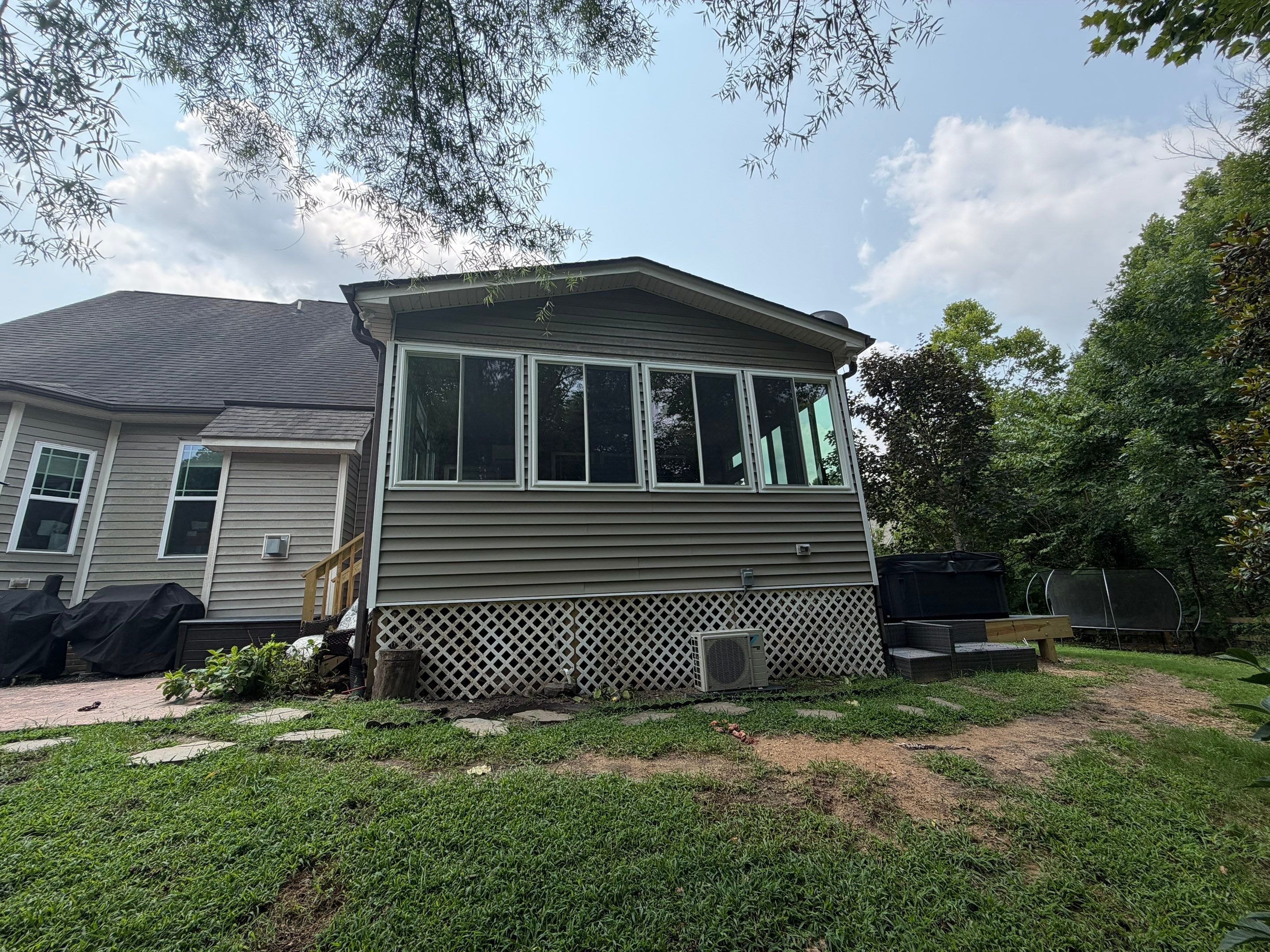 Custom Sunroom Conversion and Screened Porch Addition in Wake Forest by The Remodeling Company