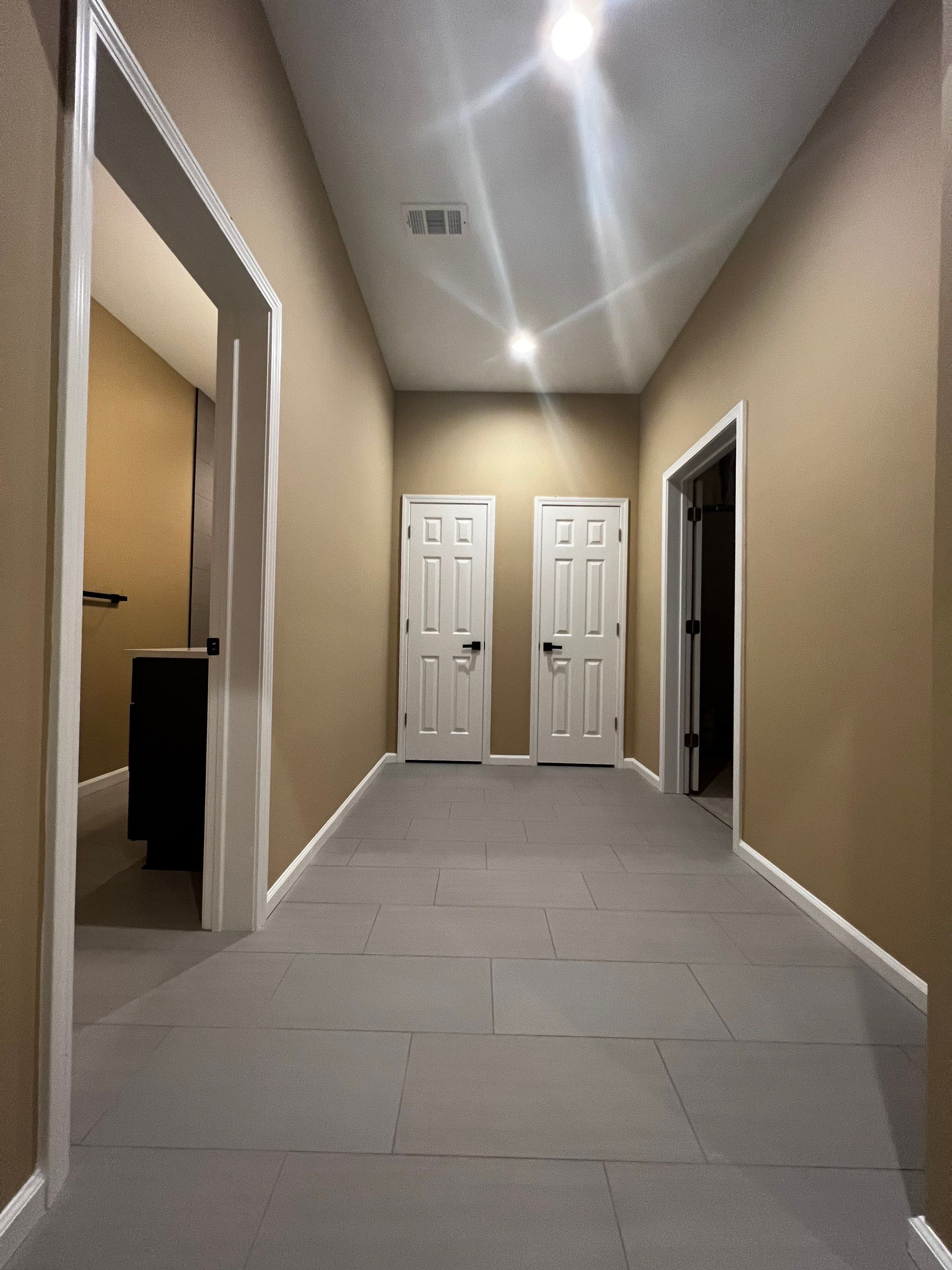 Finished Basement Renovation Featuring Polished Concrete in Atlanta by Swift Home Renovations