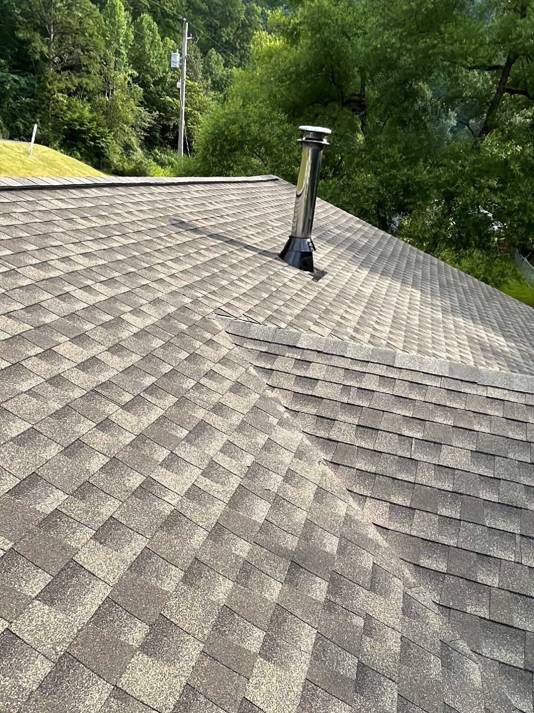 Residential Roofing Installation using Performance Shingles by Mr. Roofer