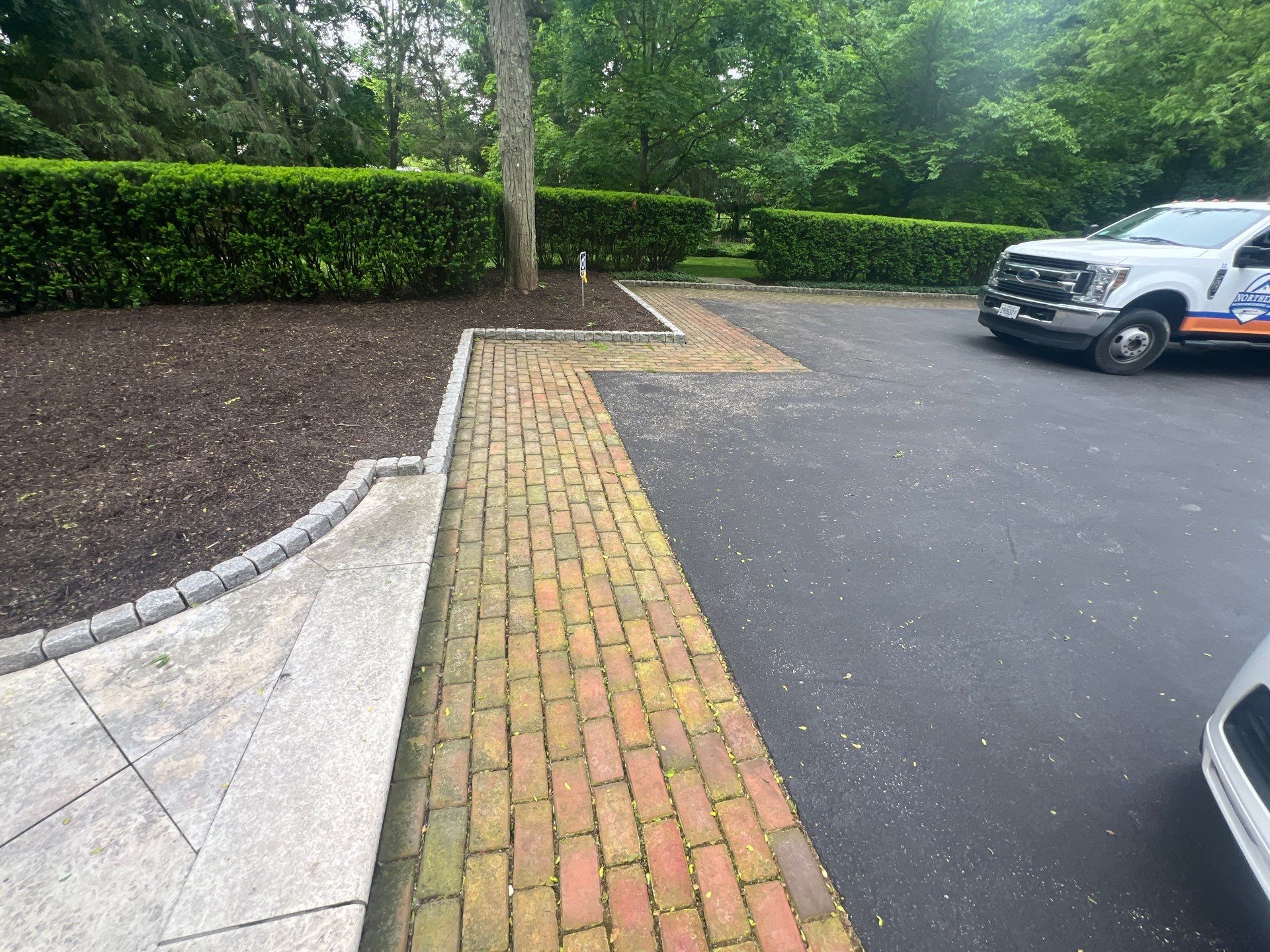 Brick paver clean, sand and seal.  using Algaecide, soft wash soap by Northern Power Washing LLC.