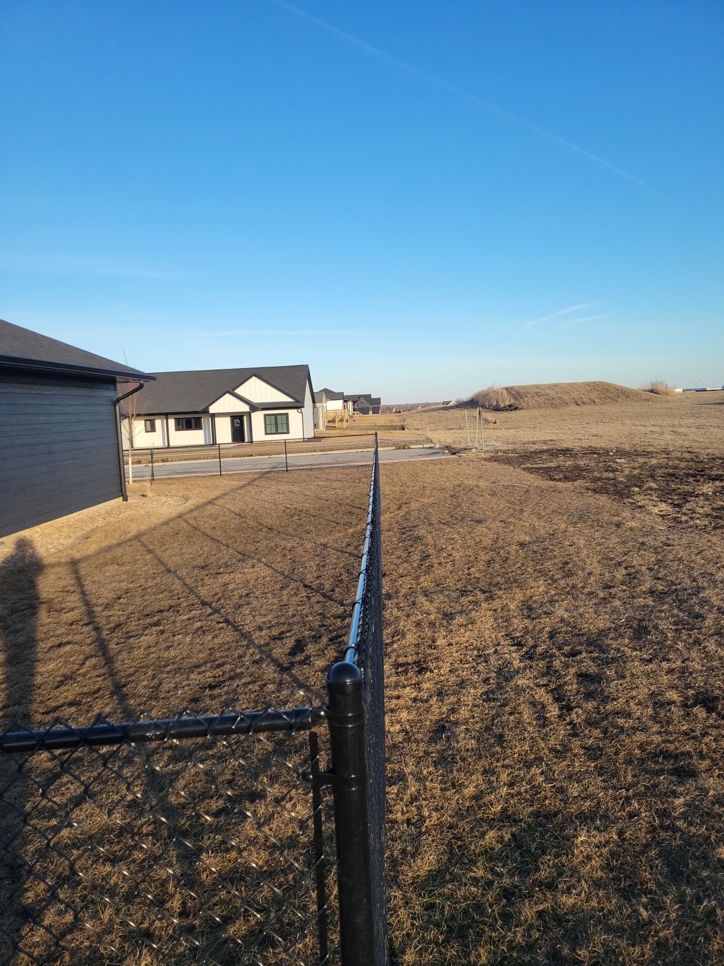 Residential Fencing Installation for New Construction Homes in Cedar Falls by Perfect Picket Fence and Stain