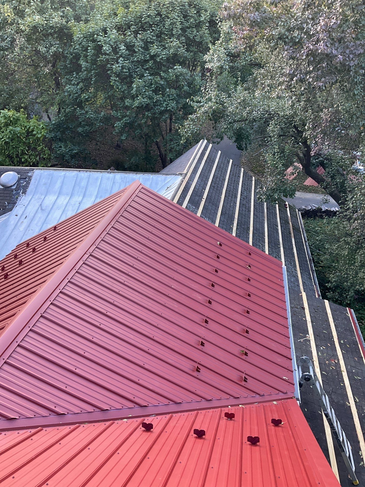 Red Metal Roofing Installation and Trim Restoration in Bernville by Esh Builders
