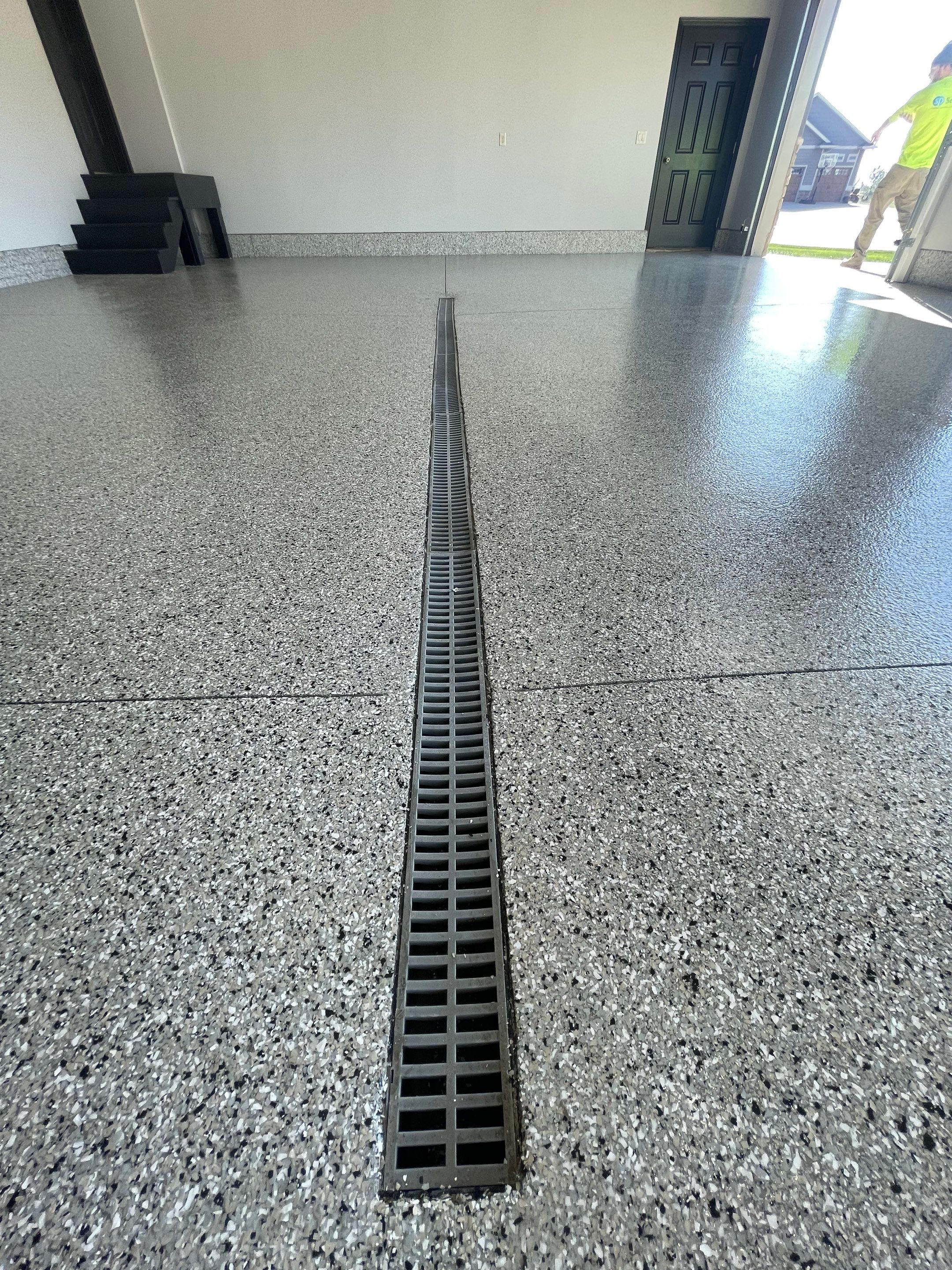 Multi-Car Garage Epoxy Floor Coating in Beresford by Select Painting, Coatings & Garage Cabinets