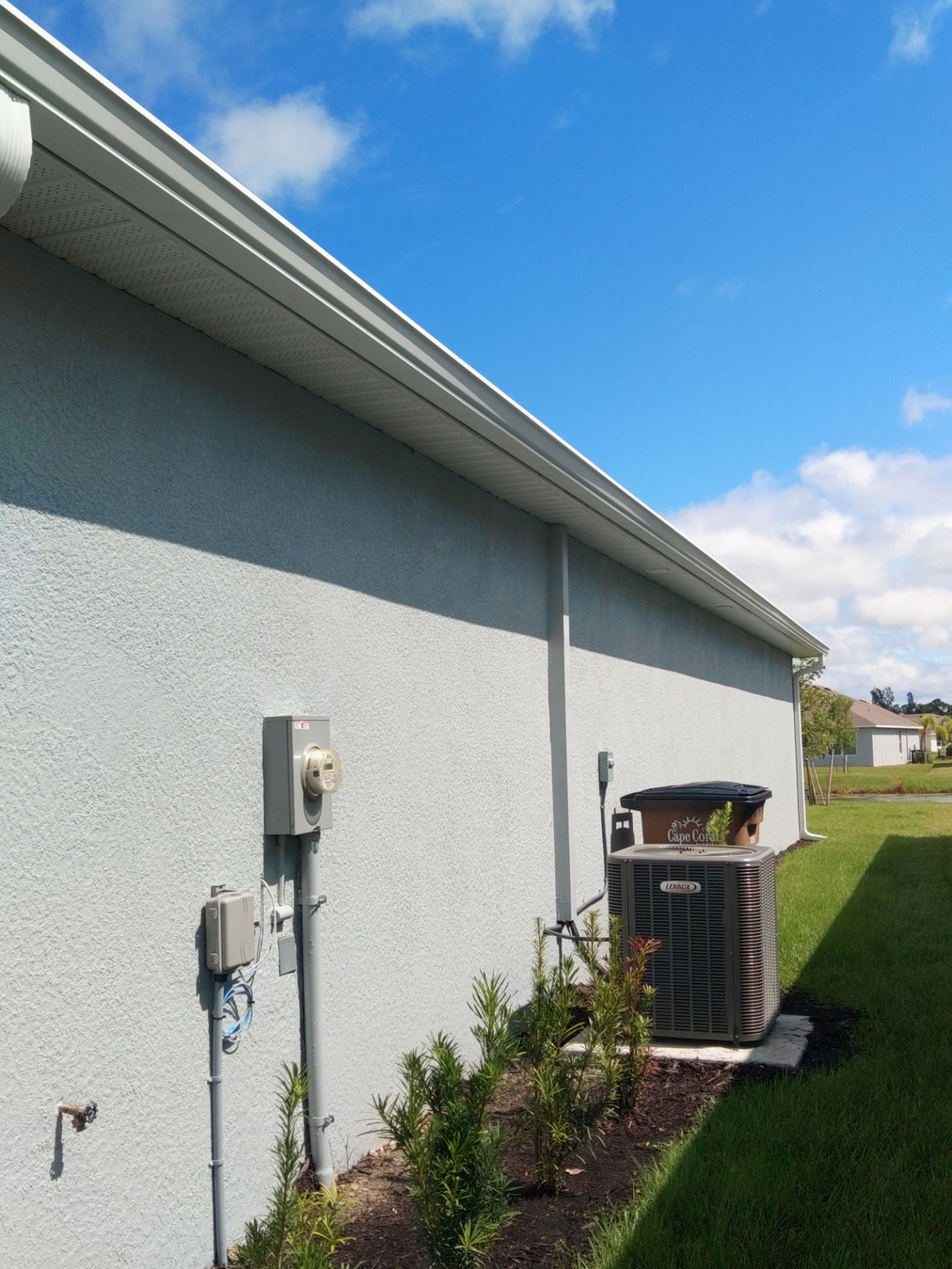 White Seamless Gutters for Beachfront Homes  by Gutter Professors