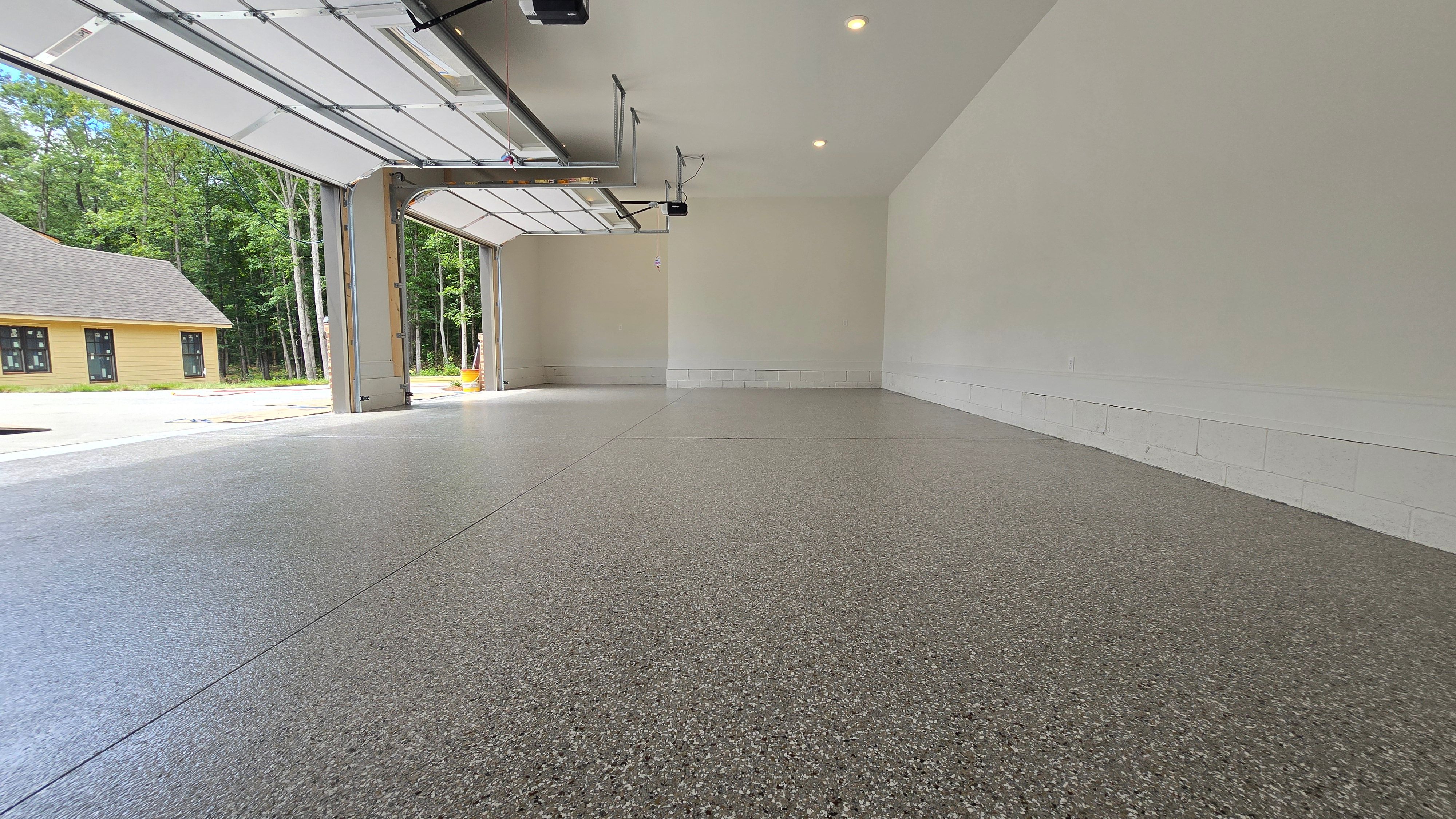Garage Using Creekbed  by Elite Floor Solutions