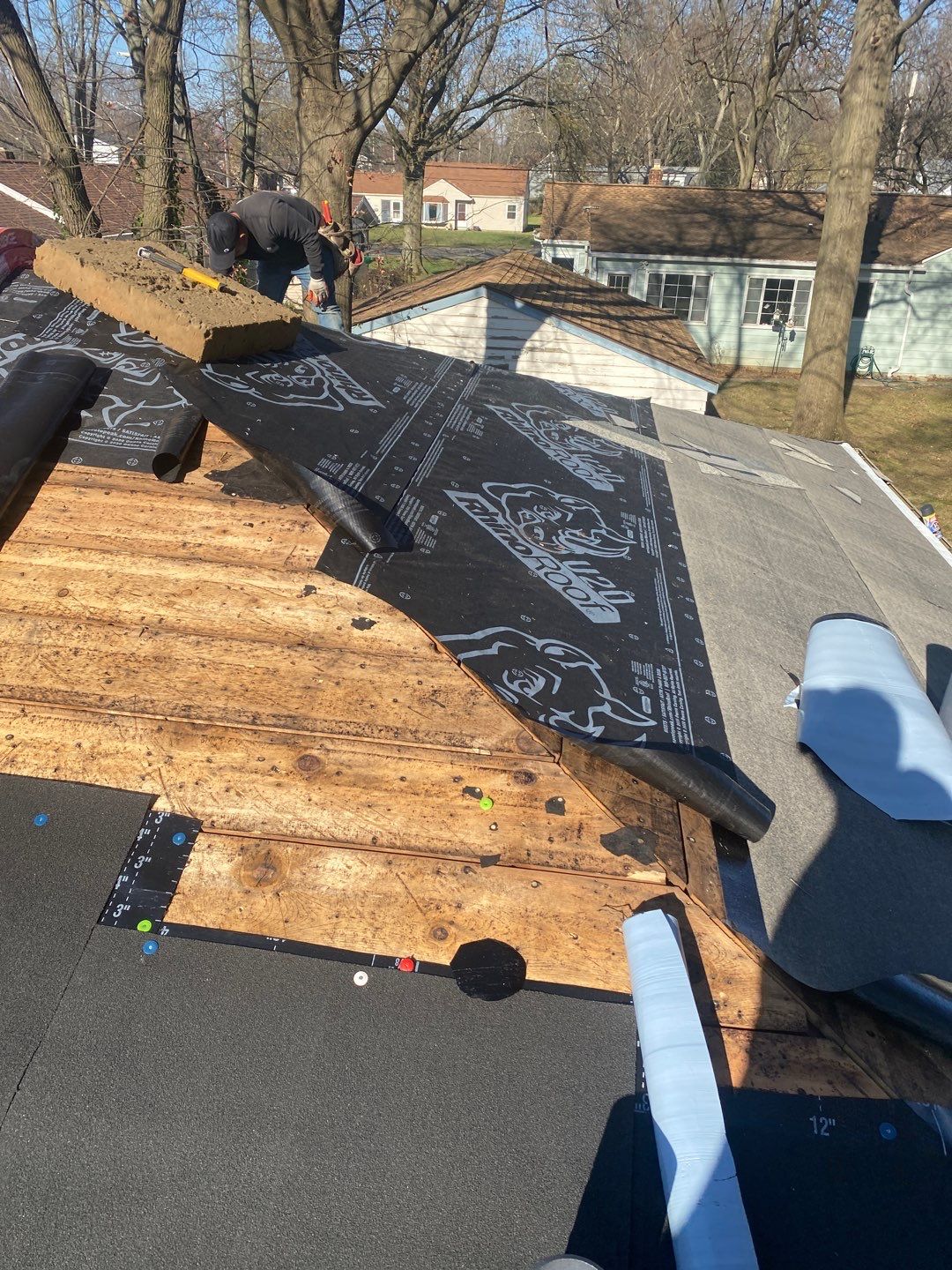 Residential Roofing Installation using Ownens Corning Duration Brownwood by Absolute Roofing and Construction