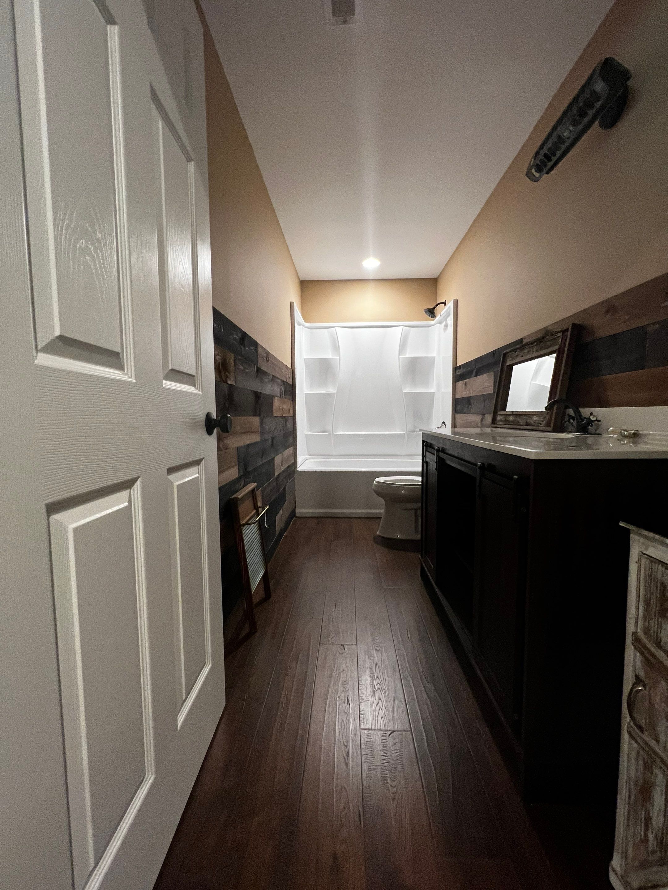 Custom Basement Remodeling With Home Theater and Bar in Woodstock by Swift Home Renovations
