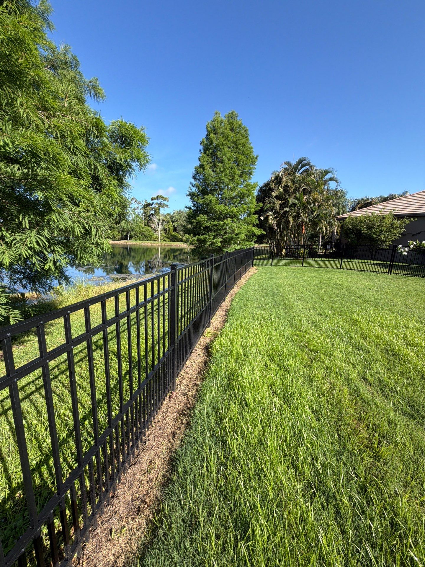 customer with puppy picket aluminum  by H&Y Fence