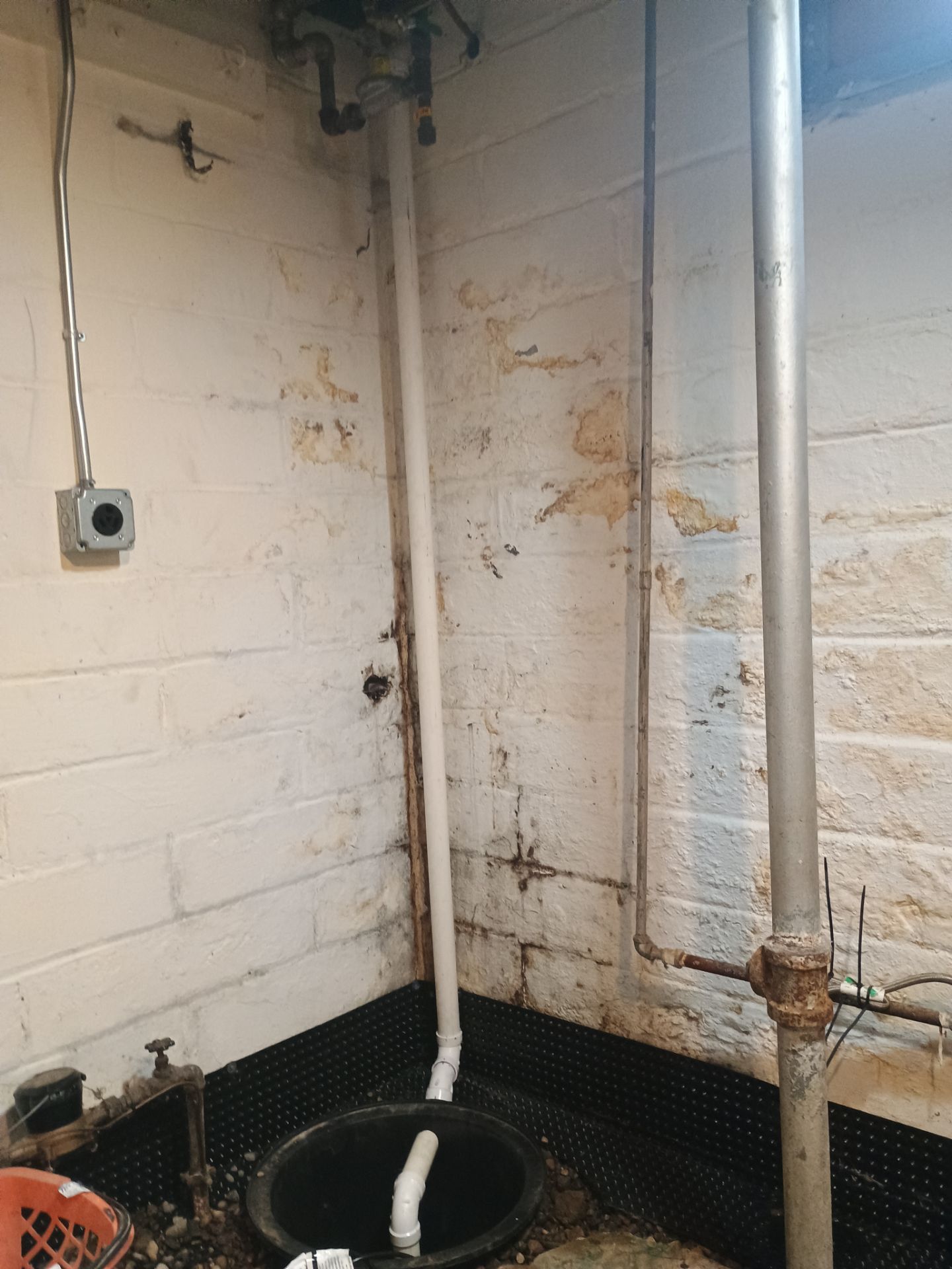 Sump Pump & Buried Discharge in Northeast Minneapolis by Waterproofing Northeast