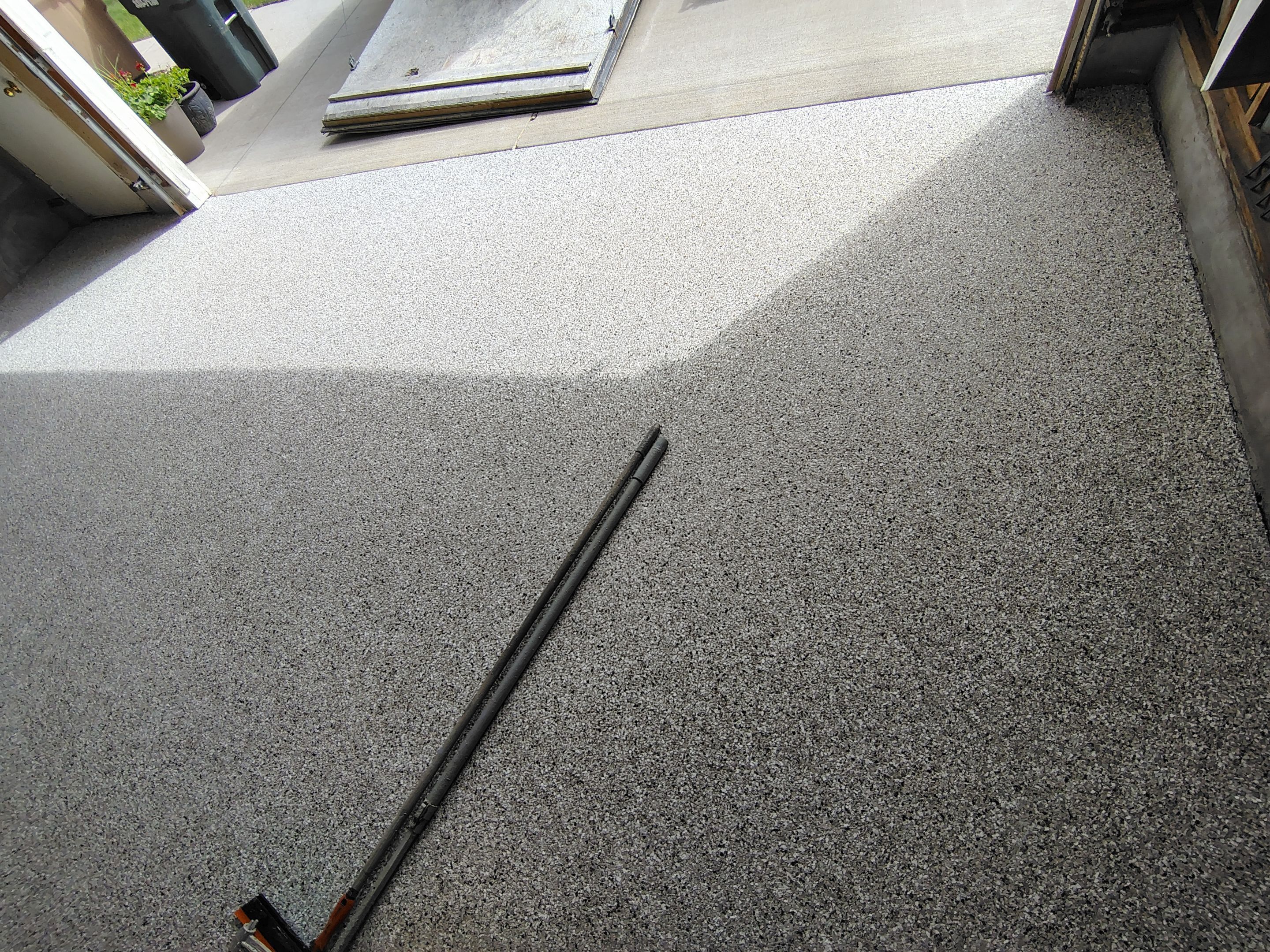 Sioux Falls Garage Epoxy Floor Installation and Concrete Crack Repair by Select Painting, Coatings & Garage Cabinets