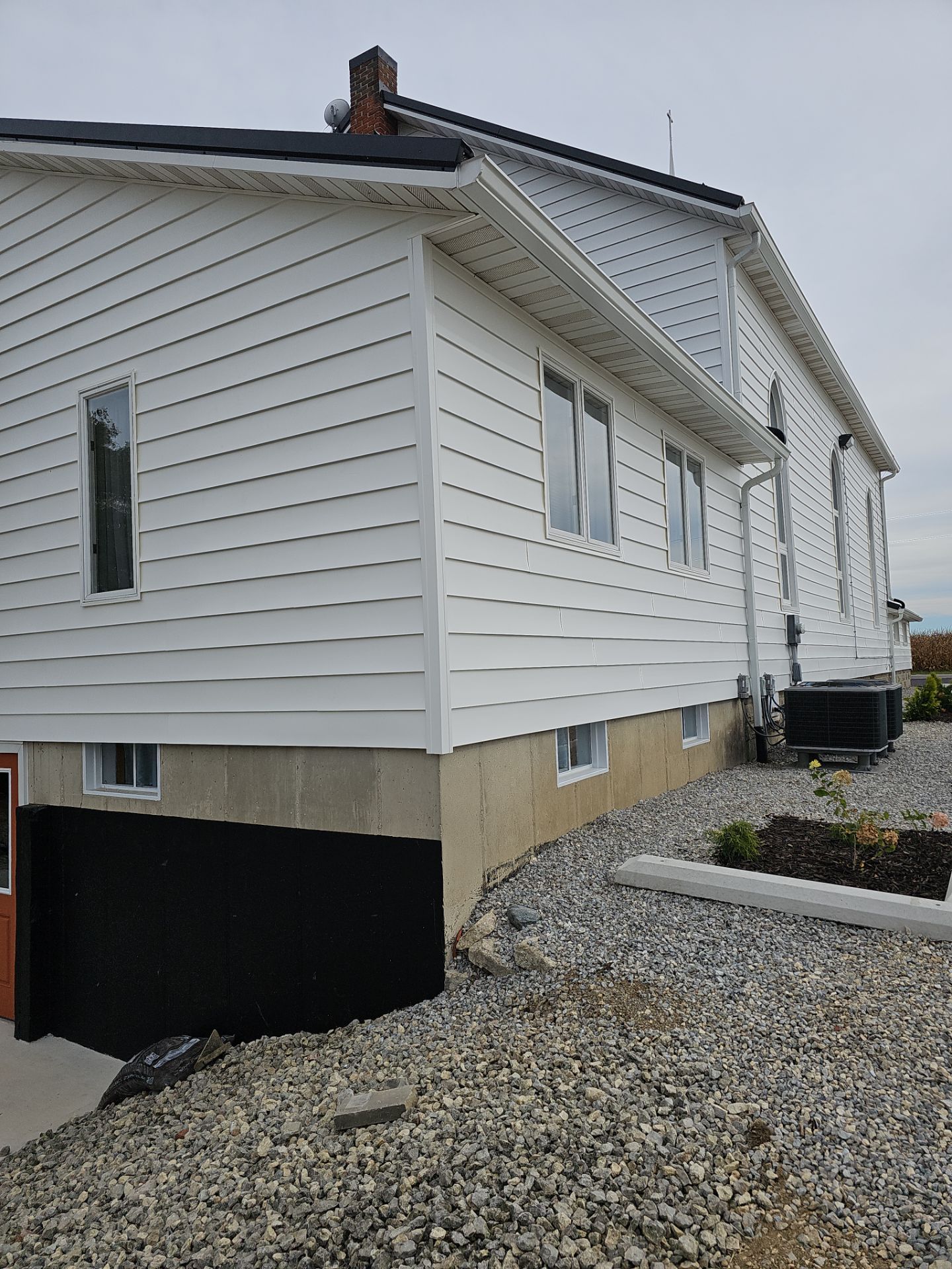 Siding Installation using Mastic 8" white  by Nitro Roofing and Construction