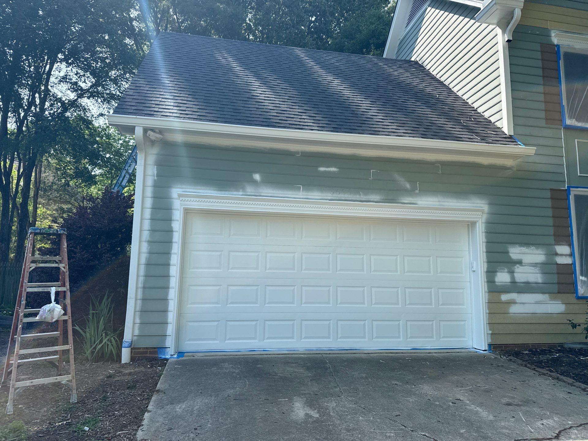 Siding Replacement and painting by GonzalezPainters & Contractors Inc 