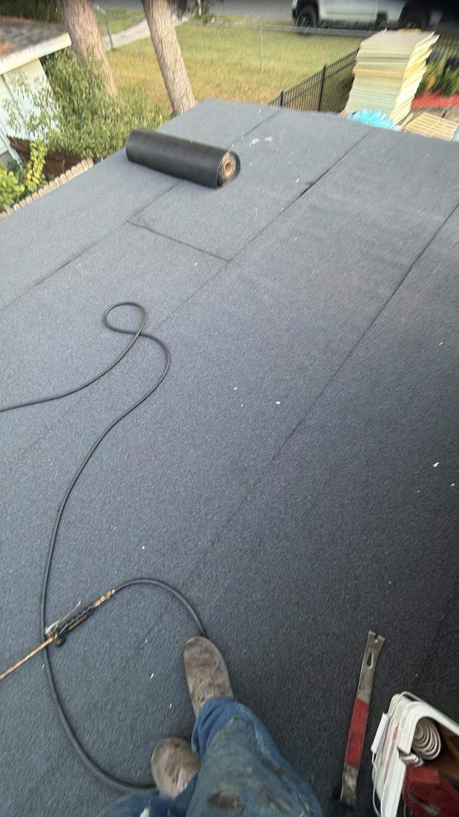 Flat Roof Renovation Due to Water Accumulation by urban green energy llc