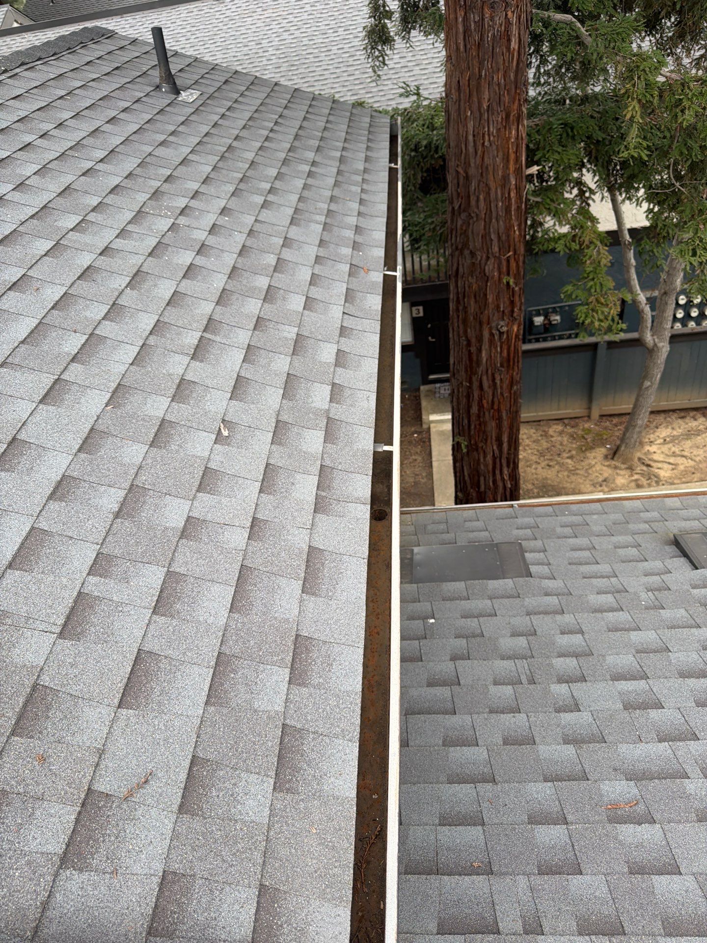 HOA gutter cleaning in Napa, CA, after  photo showing full gutters.