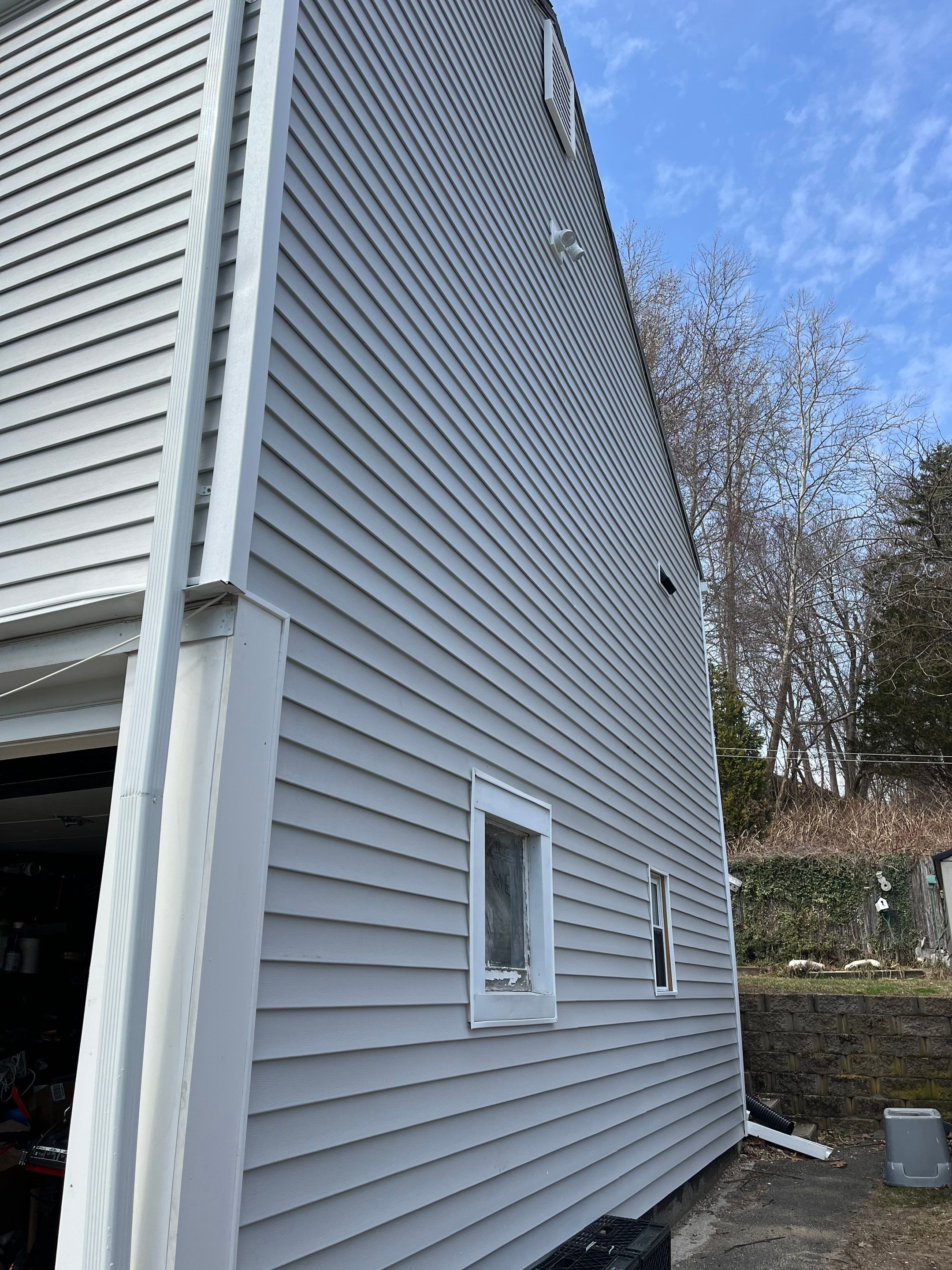 New Siding & Partial Chimney Rebuild by Regal Renovations