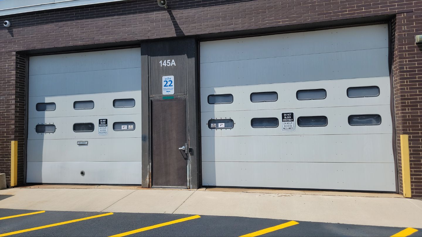 commercial pressure washing using Algaecide, soft wash soap by Northern Power Washing LLC.