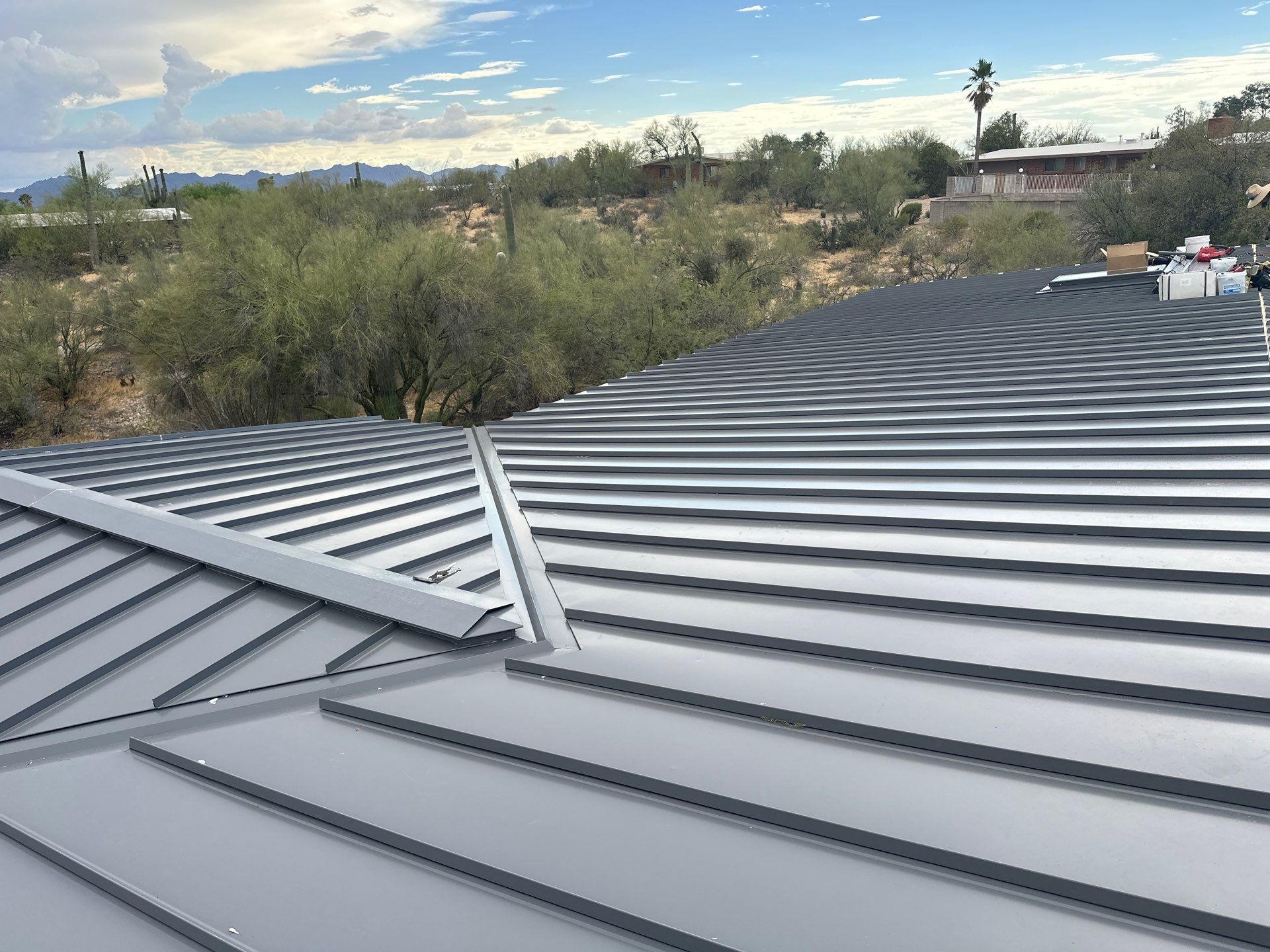 Charcoal Gray Standing Seam by Reimagine Roofing