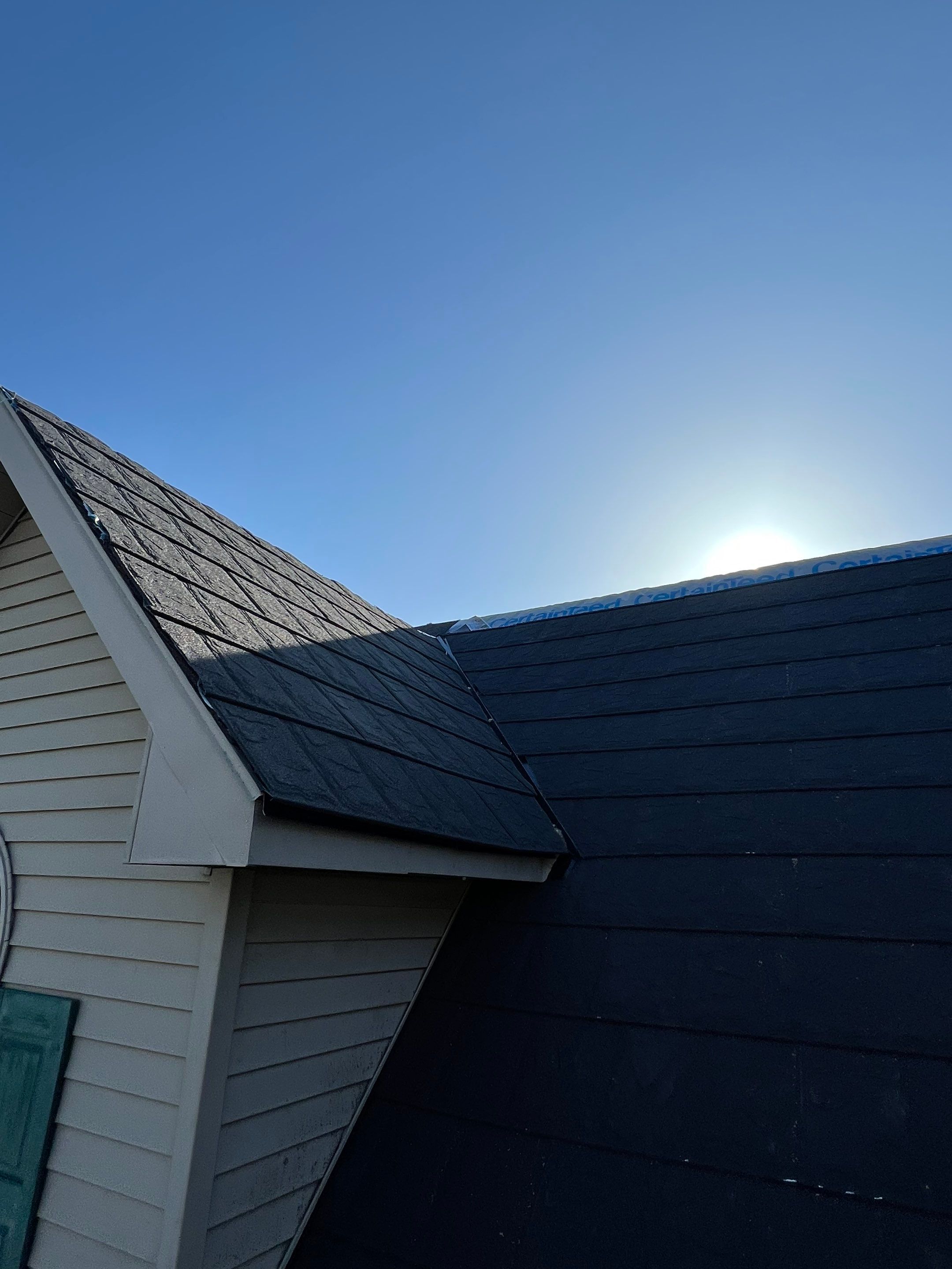 Residential Roofing Repair using Metstar Stone Coated Charcoal by Nitro Roofing and Construction
