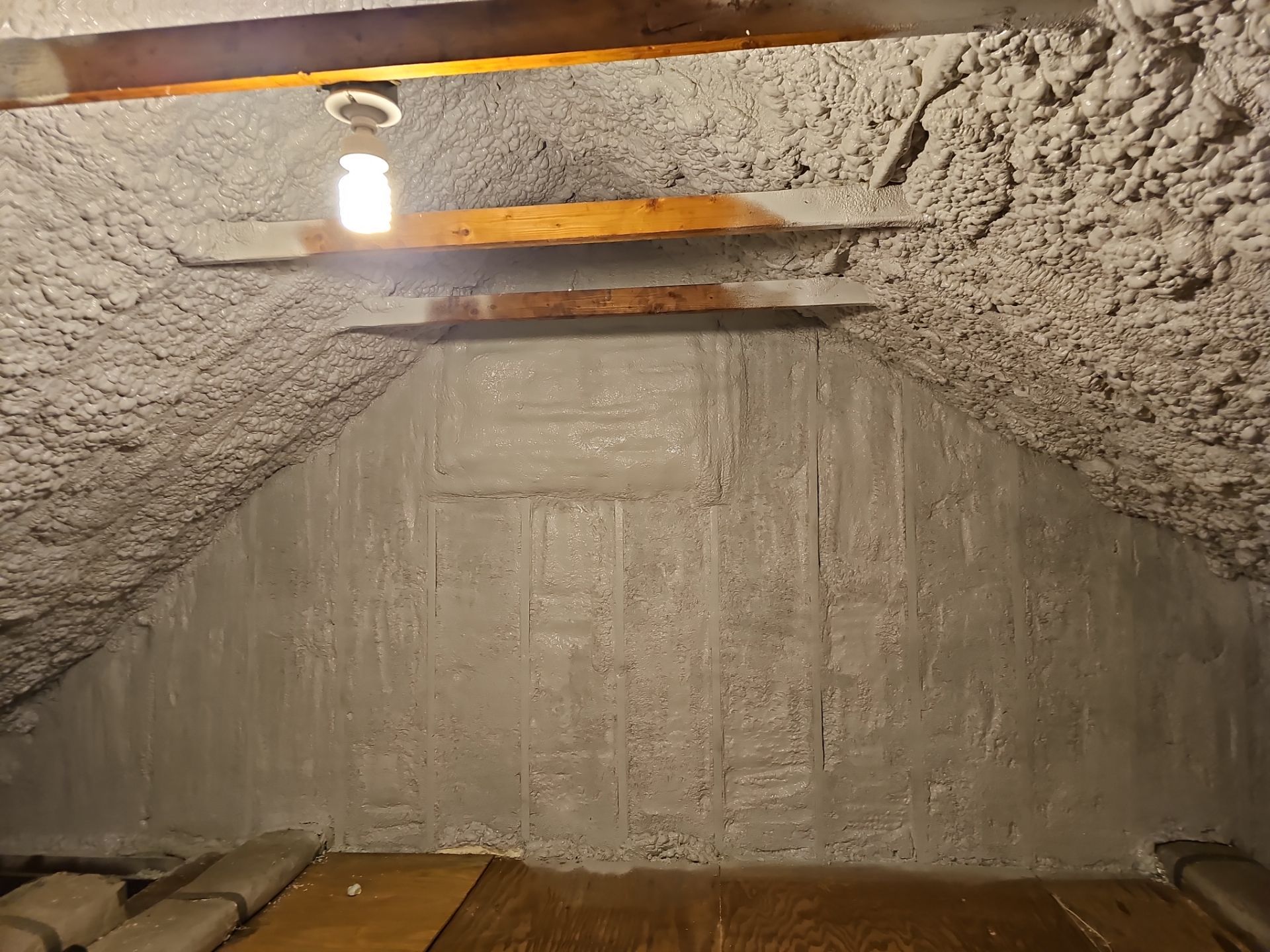Attic Retrofit using open cell spray foam by NYS Foam & Energy