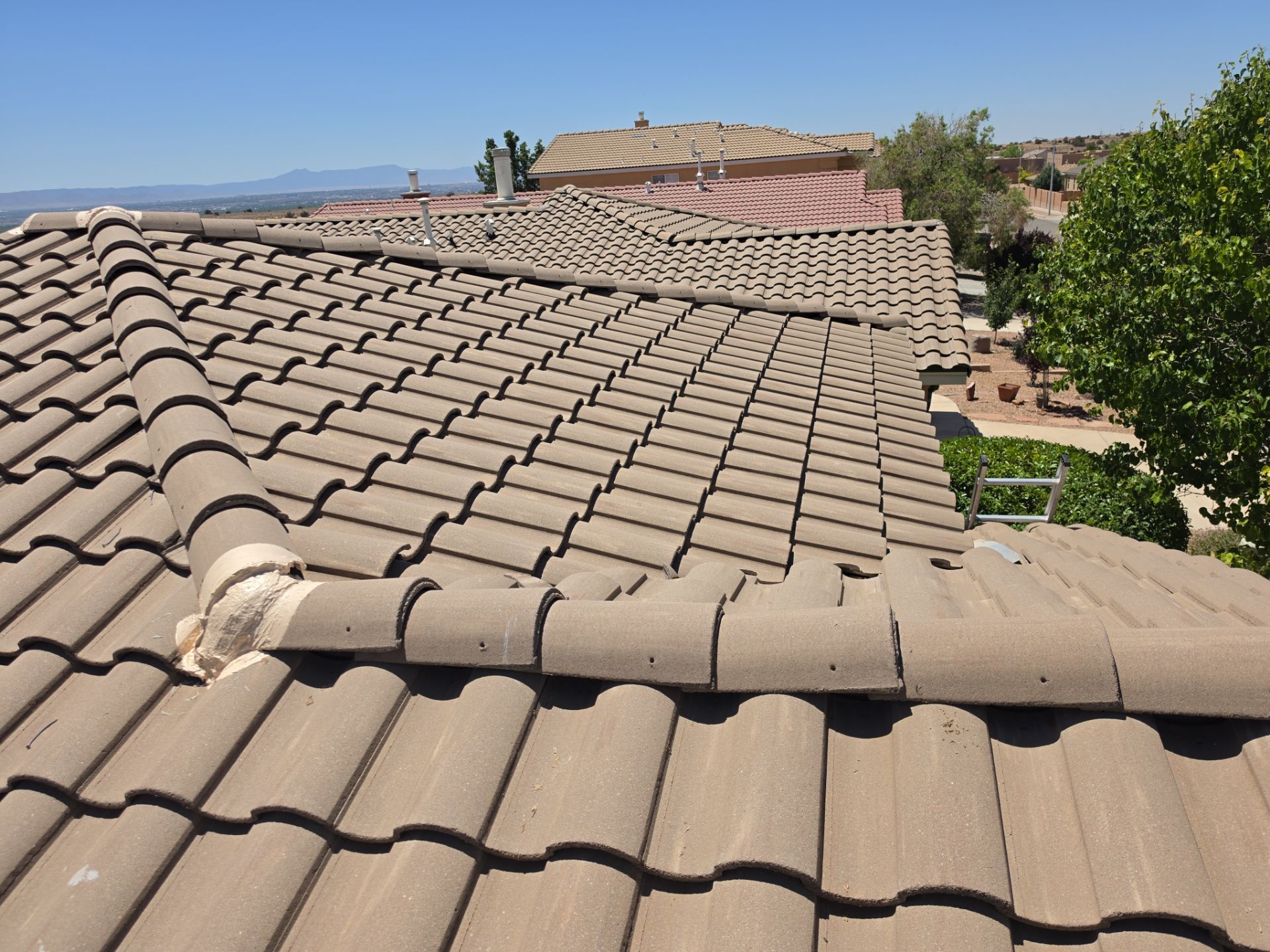Comprehensive Concrete Tile Roof Underlayment replacement and Vent Sealing in Albuquerque by Doyle Roof Masters Inc