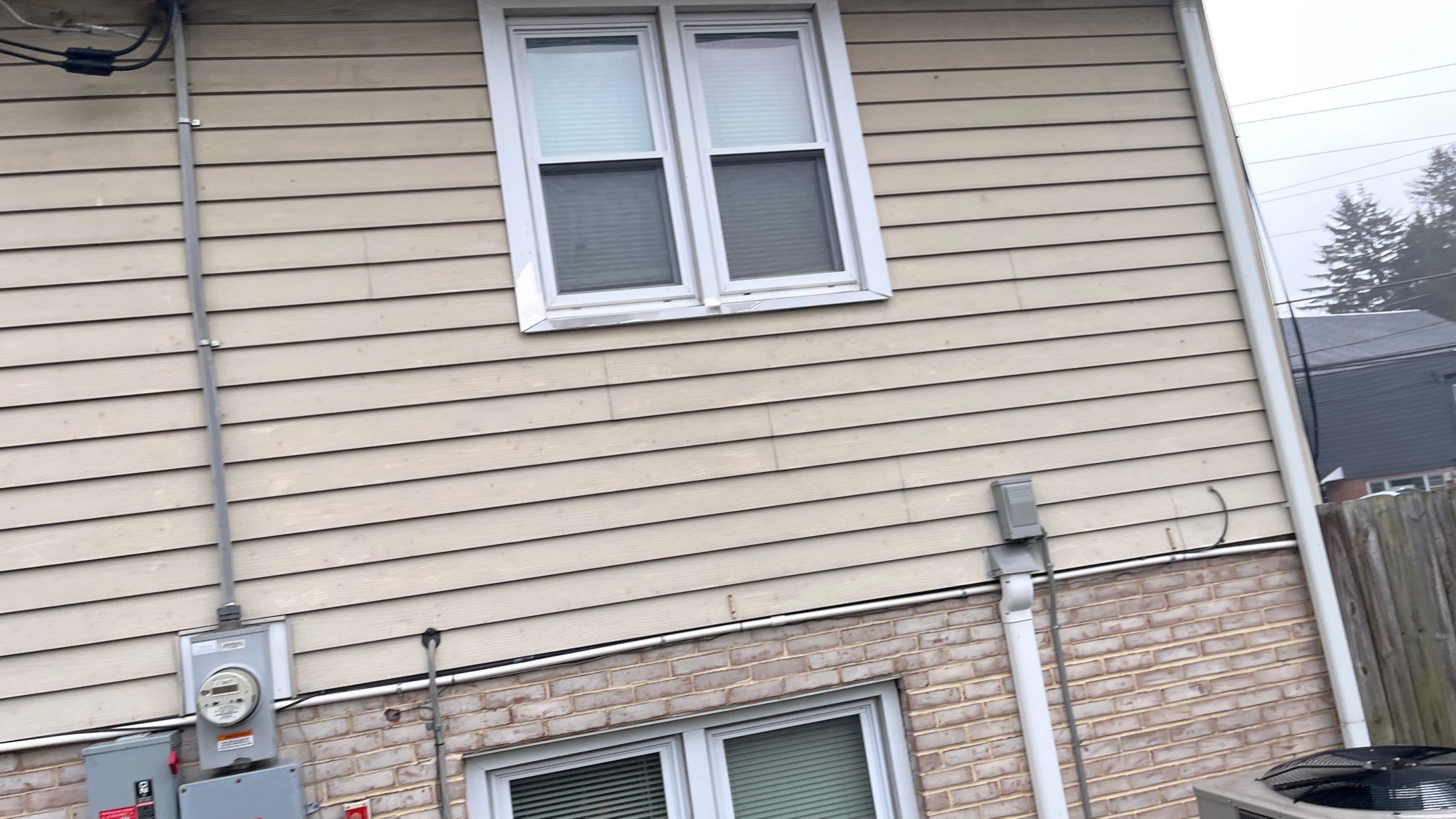 Double Hund Windows and Bow by Aspen Home Improvements