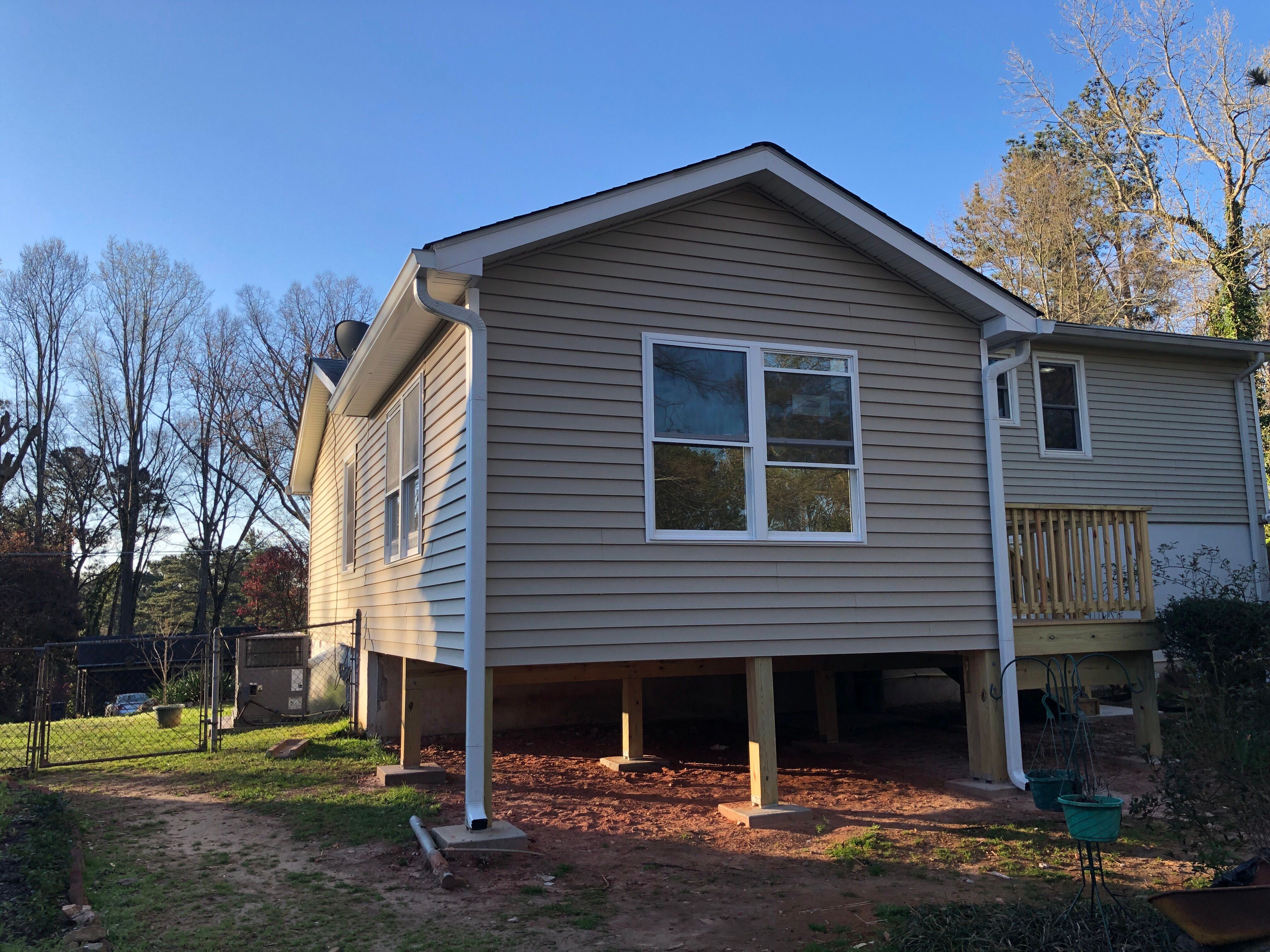 Sunroom Addition and Custom Wood Deck Installation in Marietta by Swift Home Renovations