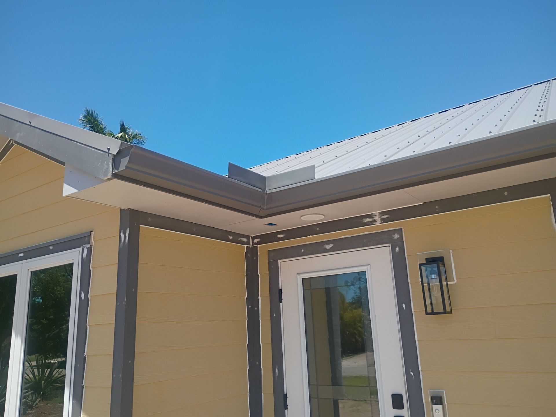 Musket Brown Seamless Gutters Installation in Saint James City, FL  by Gutter Professors