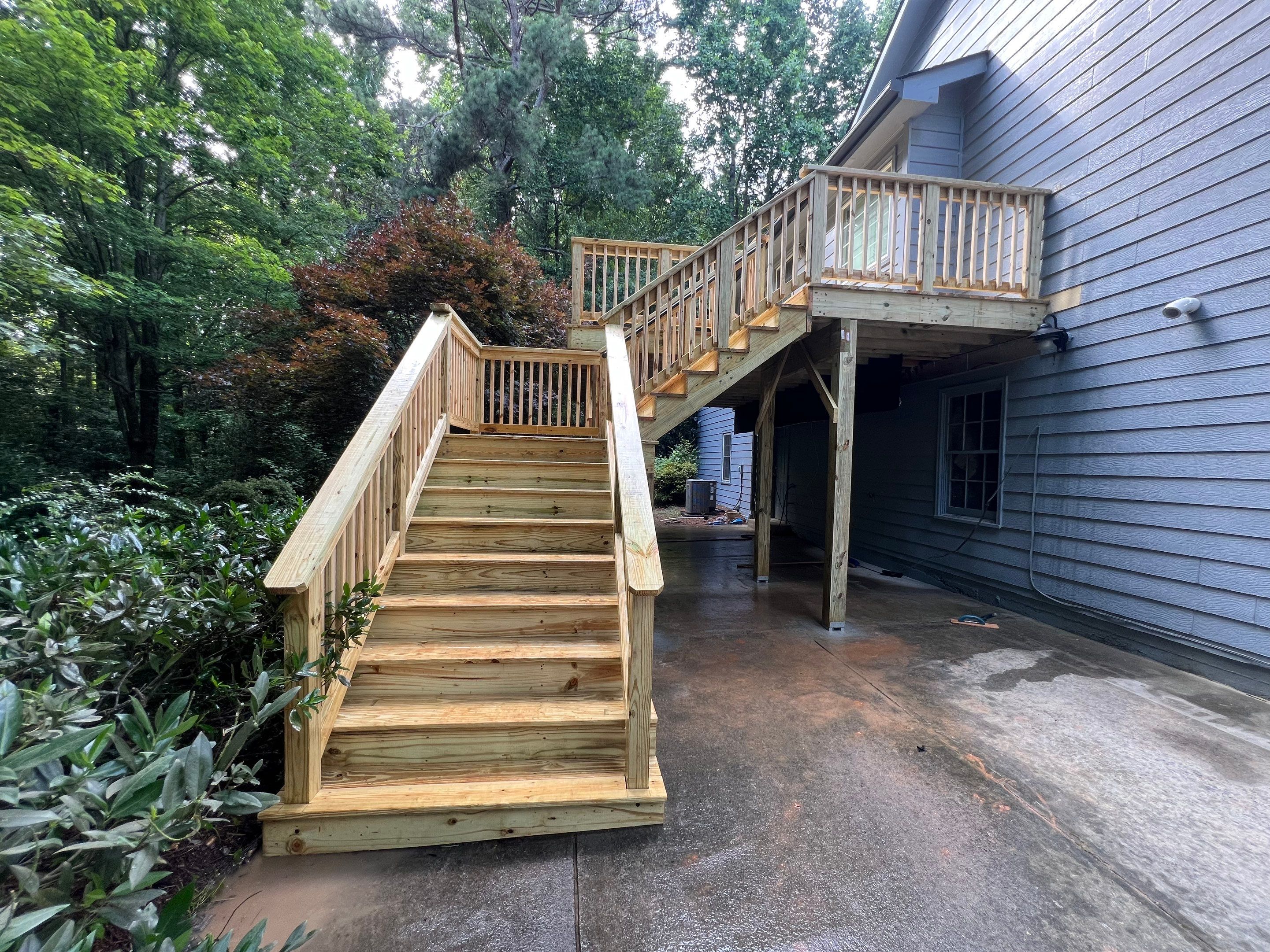 Pressure-Treated Wood Deck Replacement and Staircase Installation in Kennesaw by Swift Home Renovations