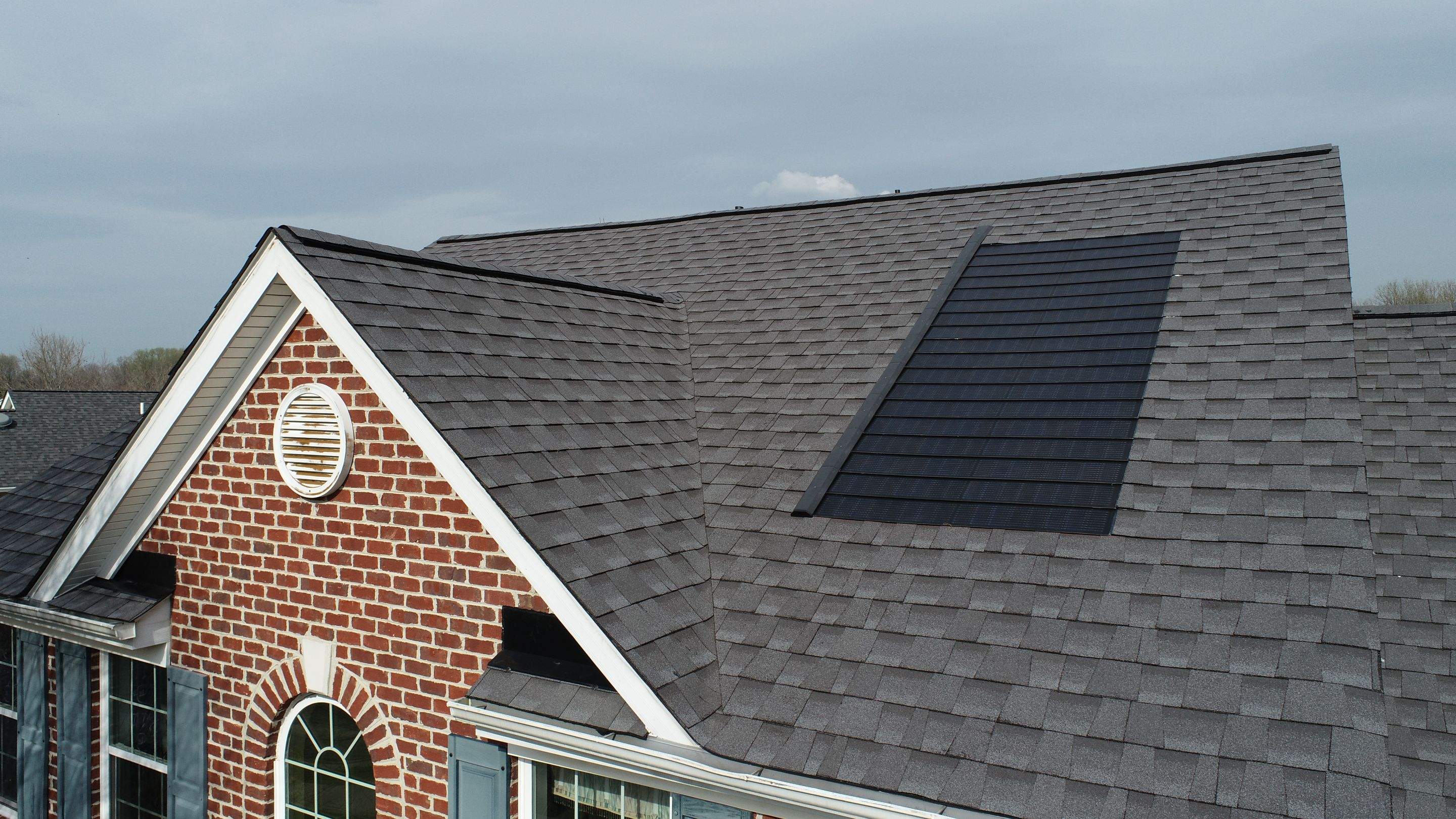 Solar Roof Replacement using GAF Timberline Solar Shingles by American Home Contractors