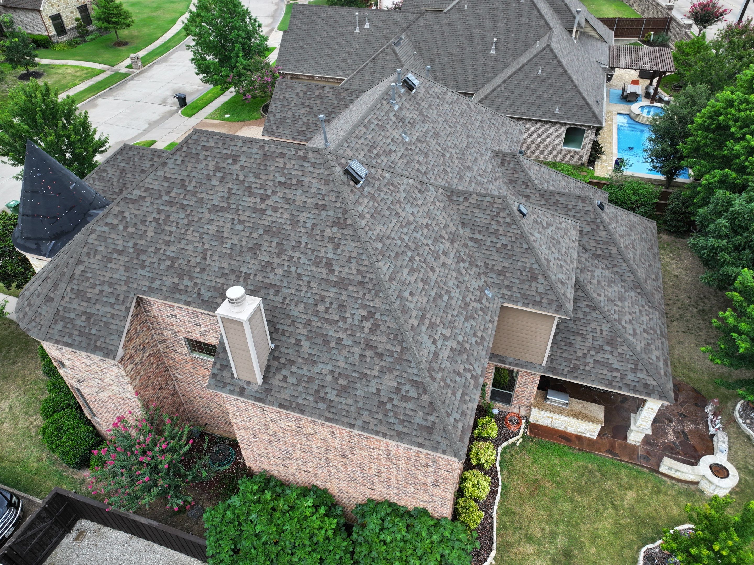 Installing Custom copper turret and Malarkey Vista Class 4 shingles Hail Damage Upgrade by Becker Roofing and Exteriors