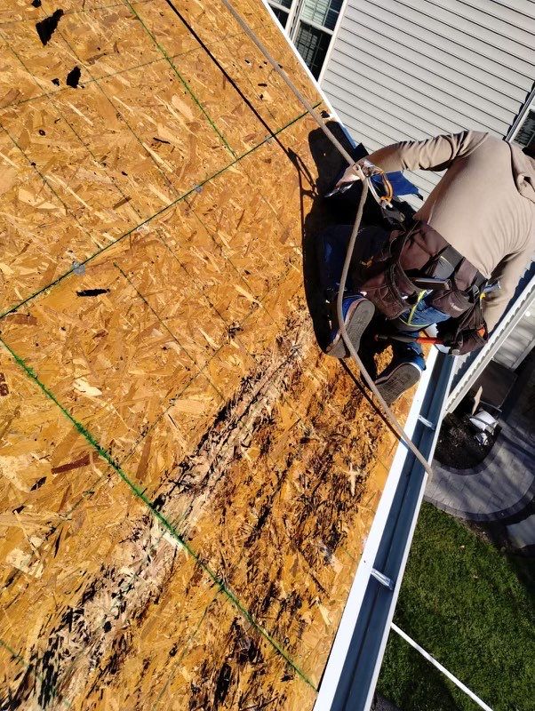 Residential Roofing Installation using Atlas Pinnacle Pristine Black Architectural Shingles by Frederick Roof Repair