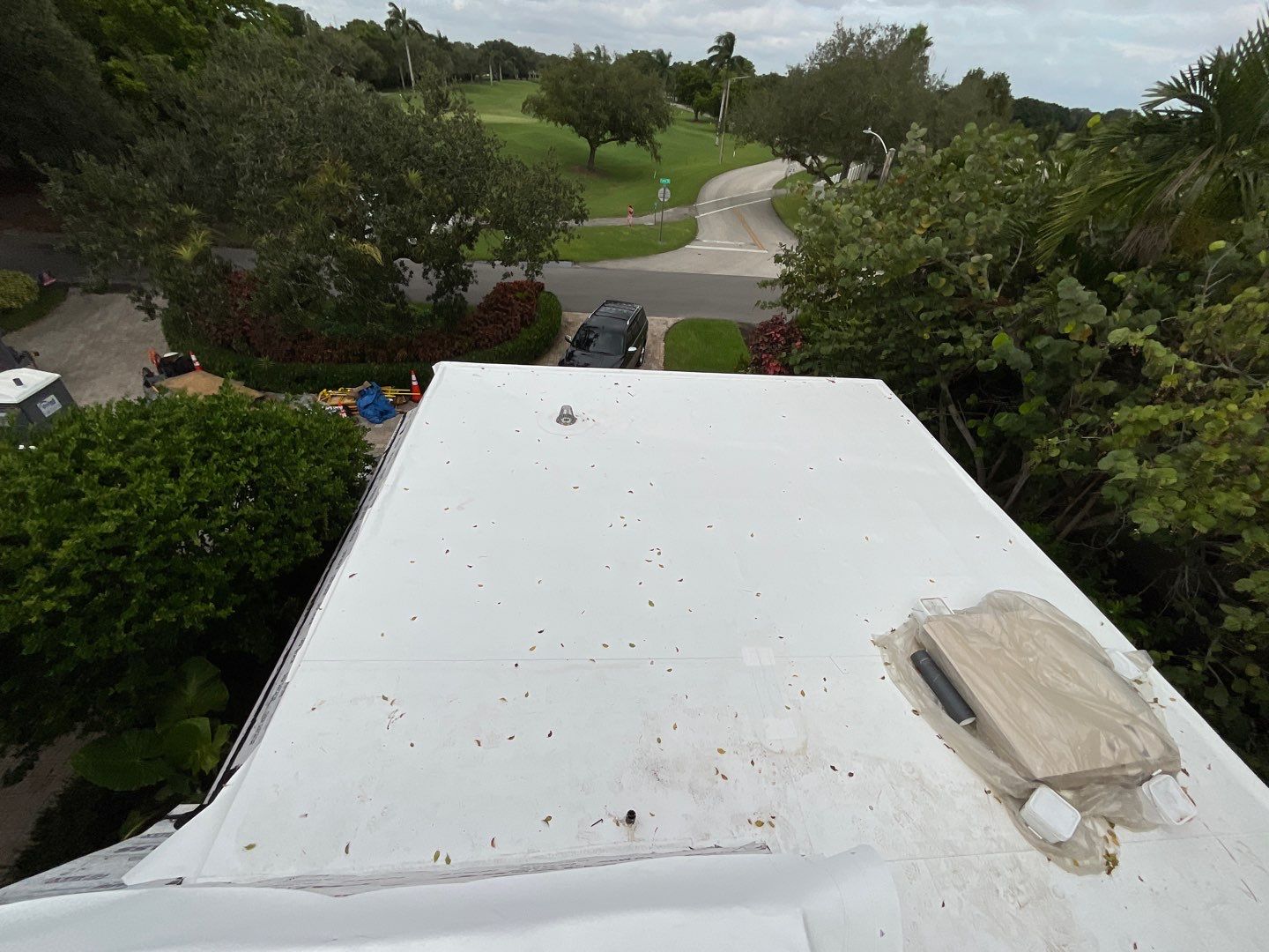 Amazing TPO flat deck re-roof with Eagle mansard in Hollywood Florida.  by First Due Roofing