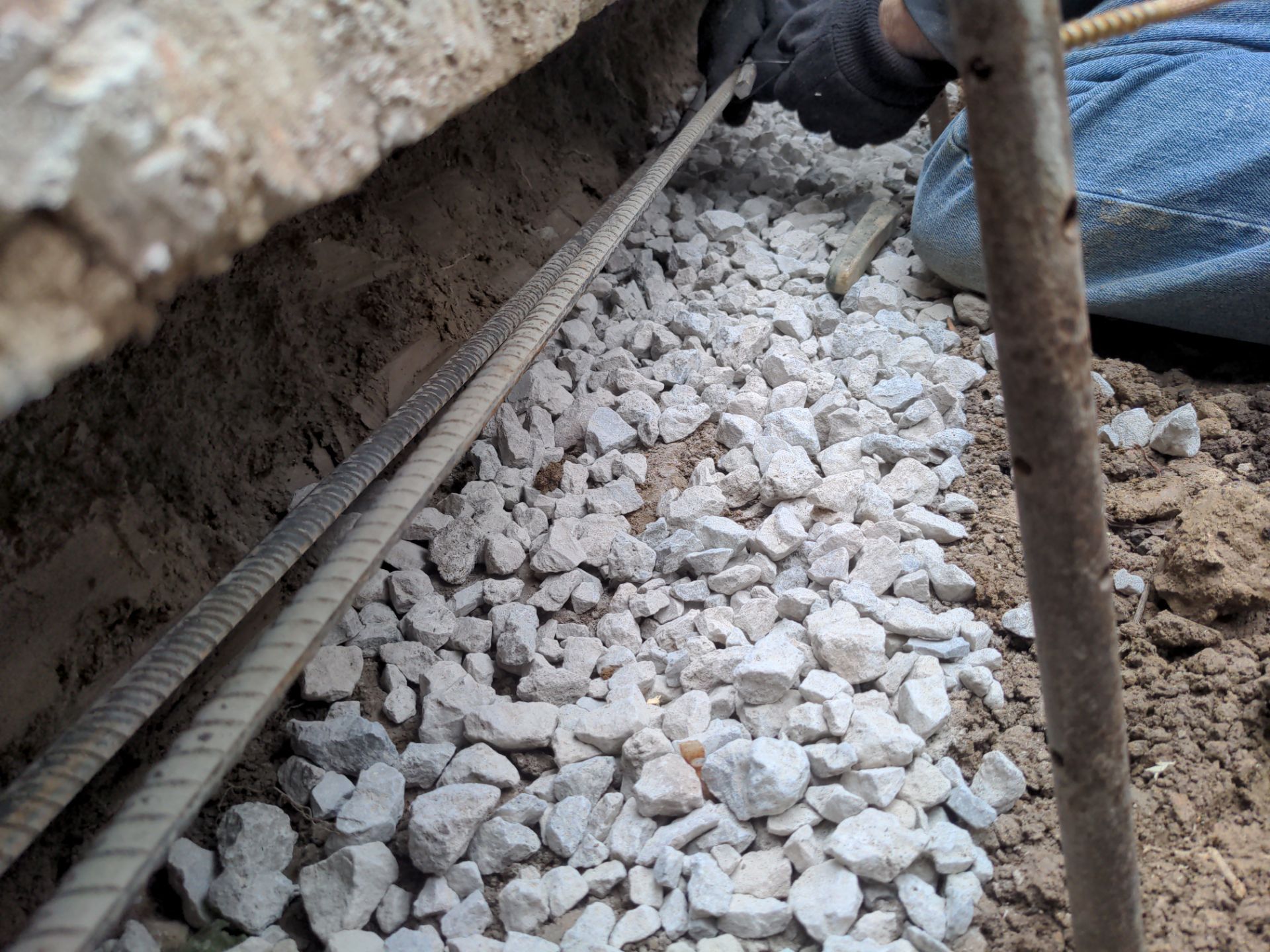 Helical Piers and Pillar Lift using Helical Foundation Footings by Toledo Basement Repair