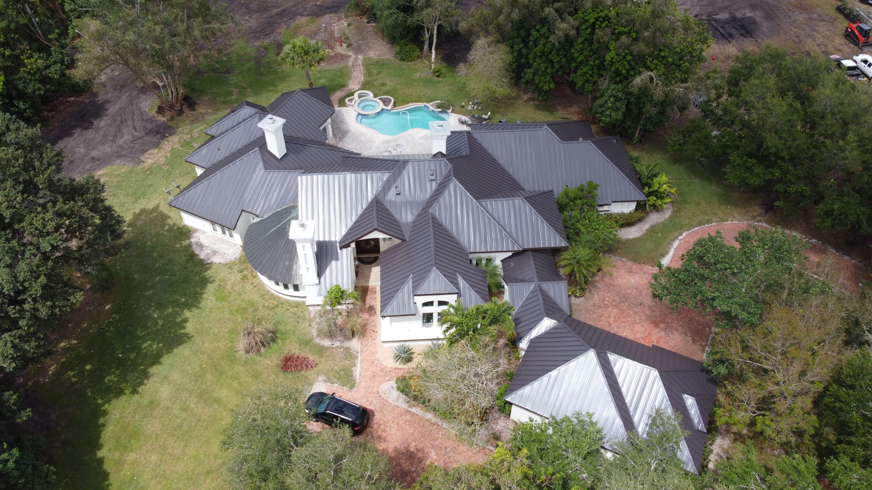 Residential Roofing Installation using 1" Nail strip metal roof by BLUES BROTHERS ROOFING