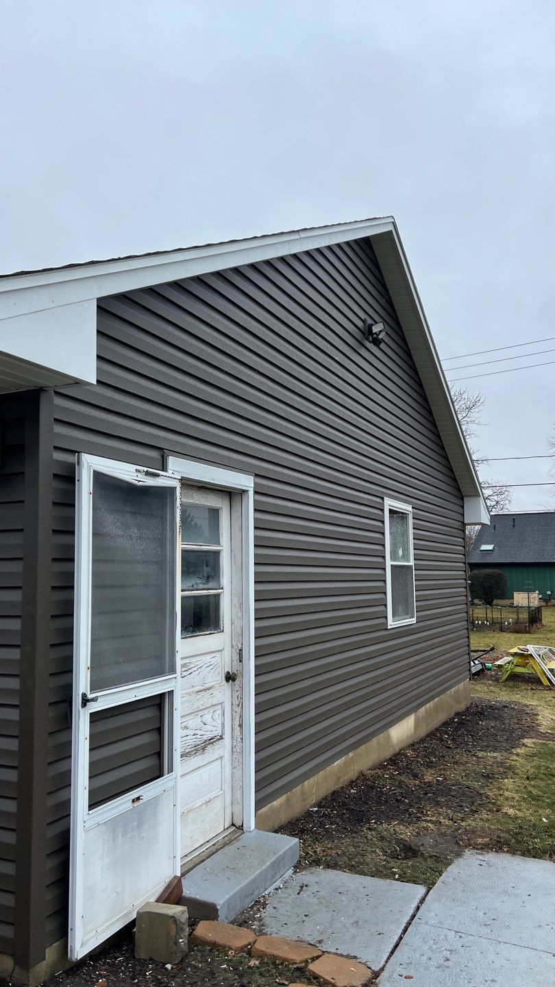 Residential fascia replacement using Exterior Portfolio 4.5 DL - Peppercorn by Nitro Roofing and Construction