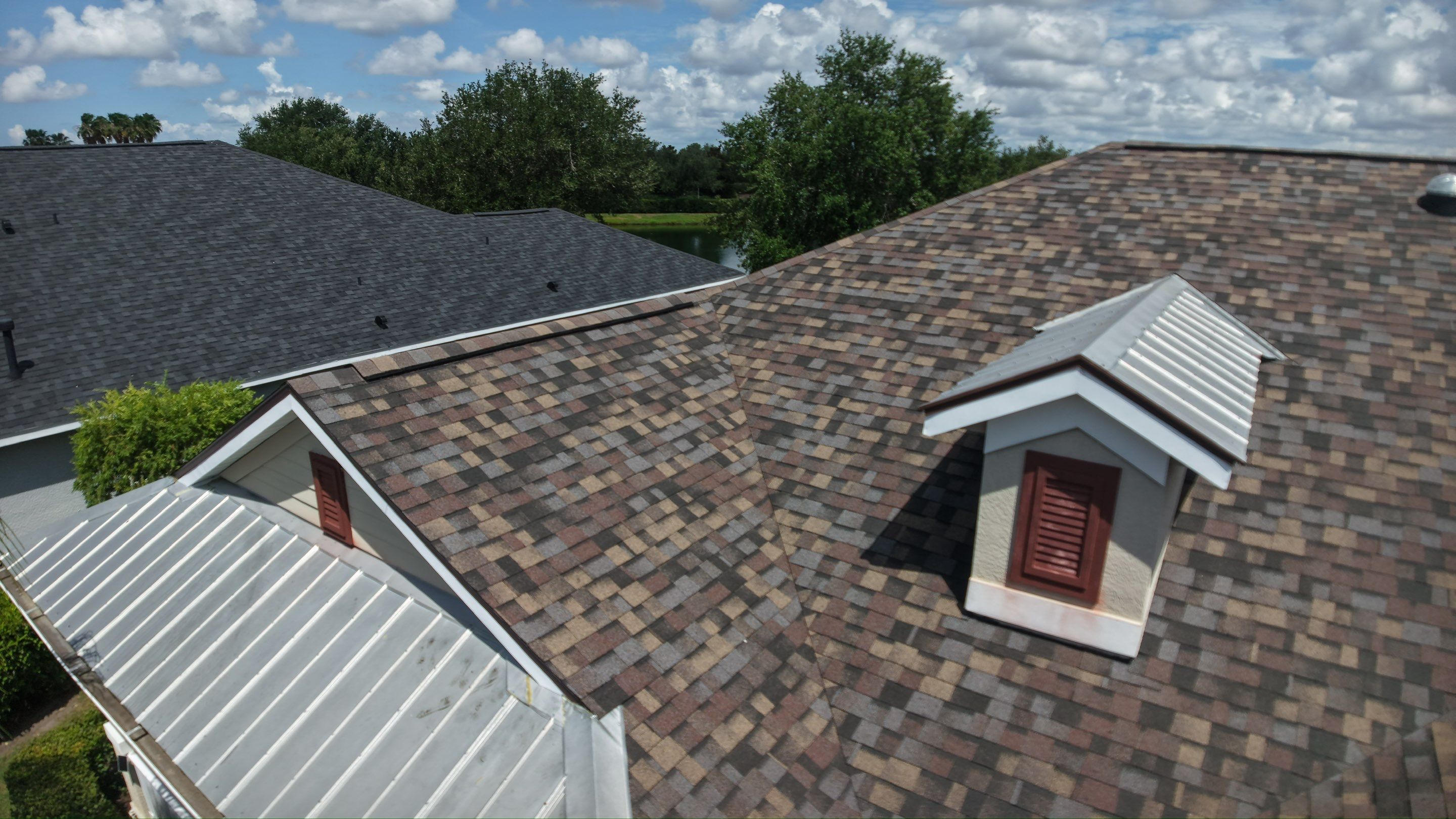 Architectural Summer Harvest Asphalt Shingle Roof Replacement in Bradenton, Florida by Trinity Restoration and Roofing LLC