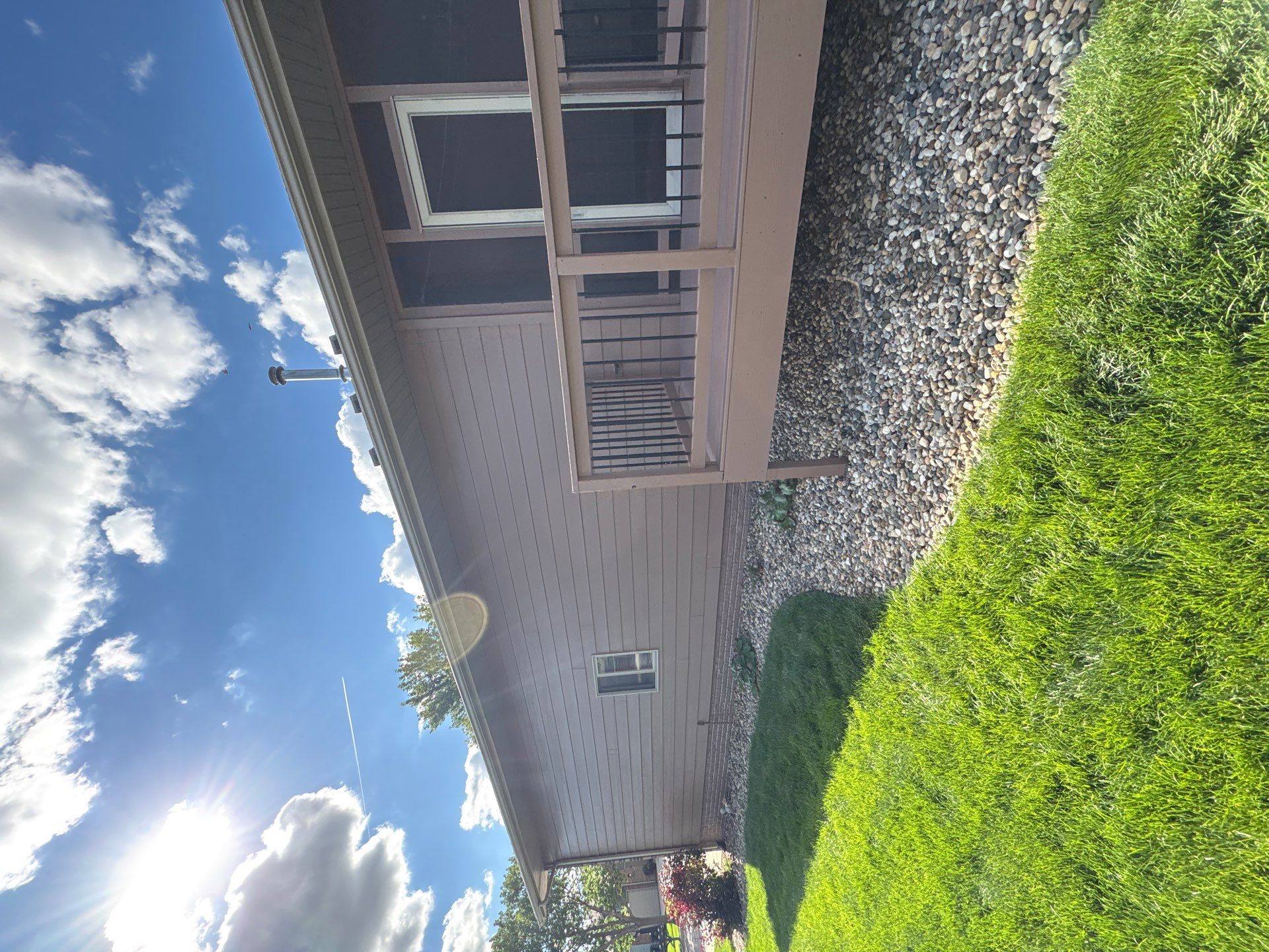 Exterior Painting and Wooden Deck Staining in Sioux Falls by Select Painting, Coatings & Garage Cabinets