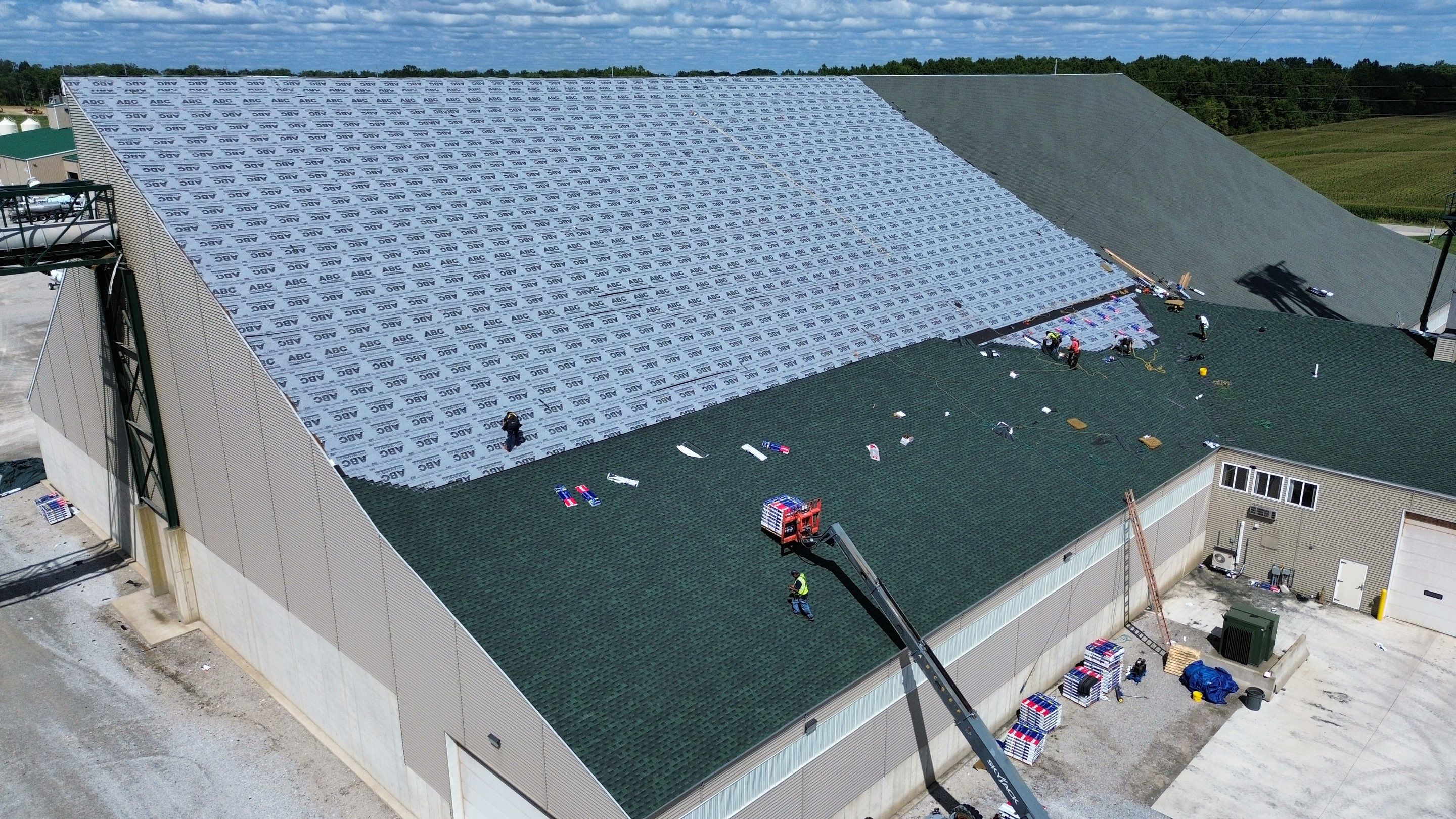Commercial Roofing Installation using Timberline HDZ Shingles - Hunter Green by RoofX 