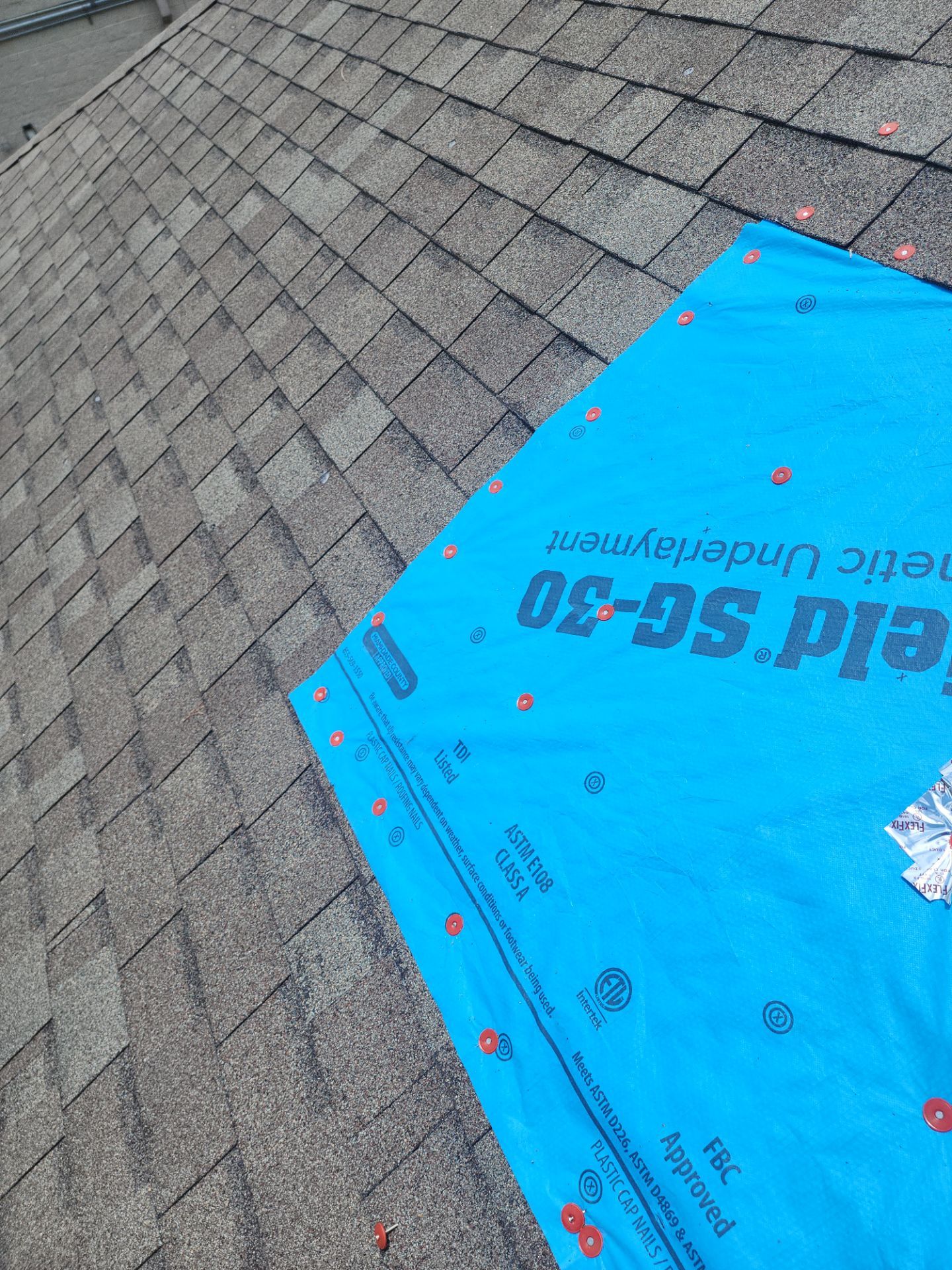 Hail Damage using Owen's Corning Duration (Lifetime) Shingles by Roof Repair Company