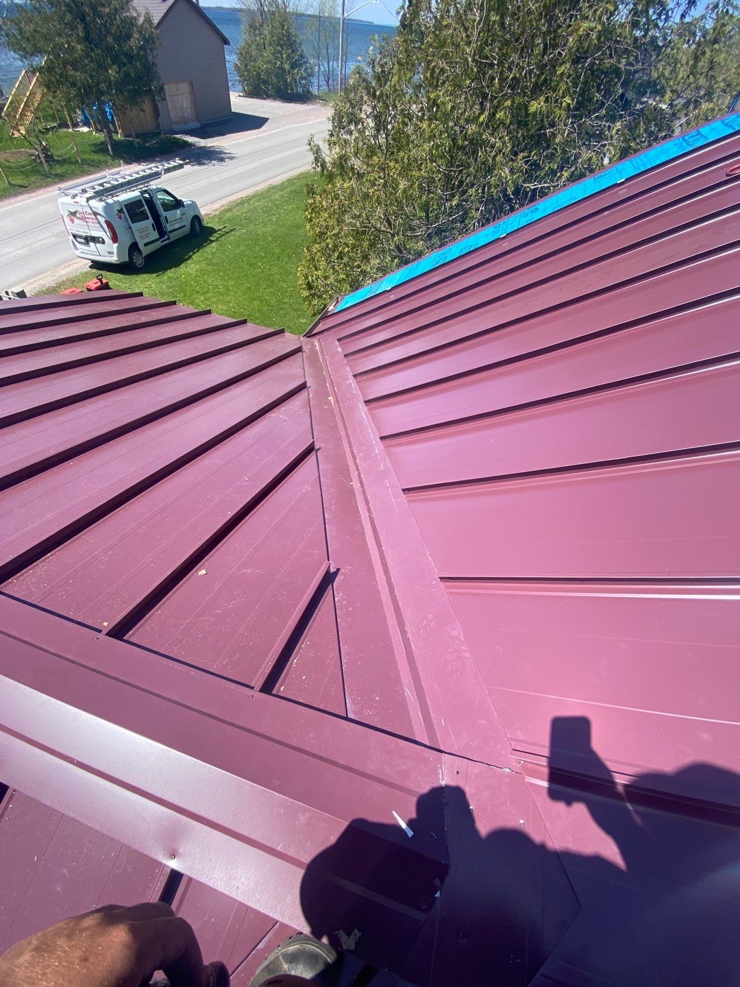 Residential Roofing Installation using 16" Standing Seam Panels by Jay Carter Roofing & Sheet Metal