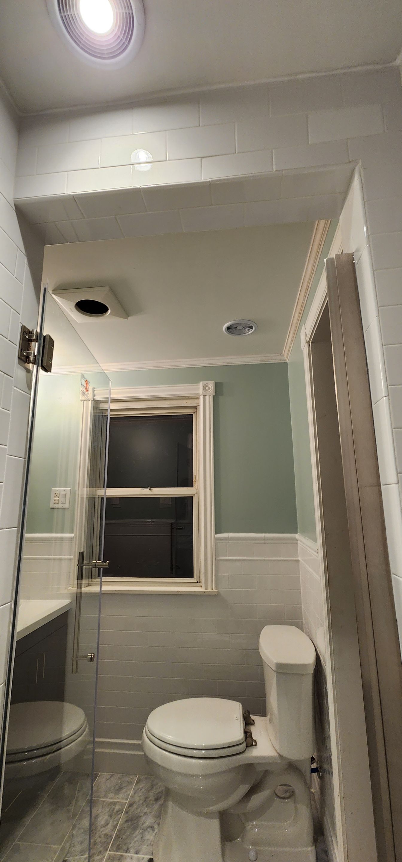 Full bathroom, tile shower, tile floor, tile wainscoting by The Shower Company