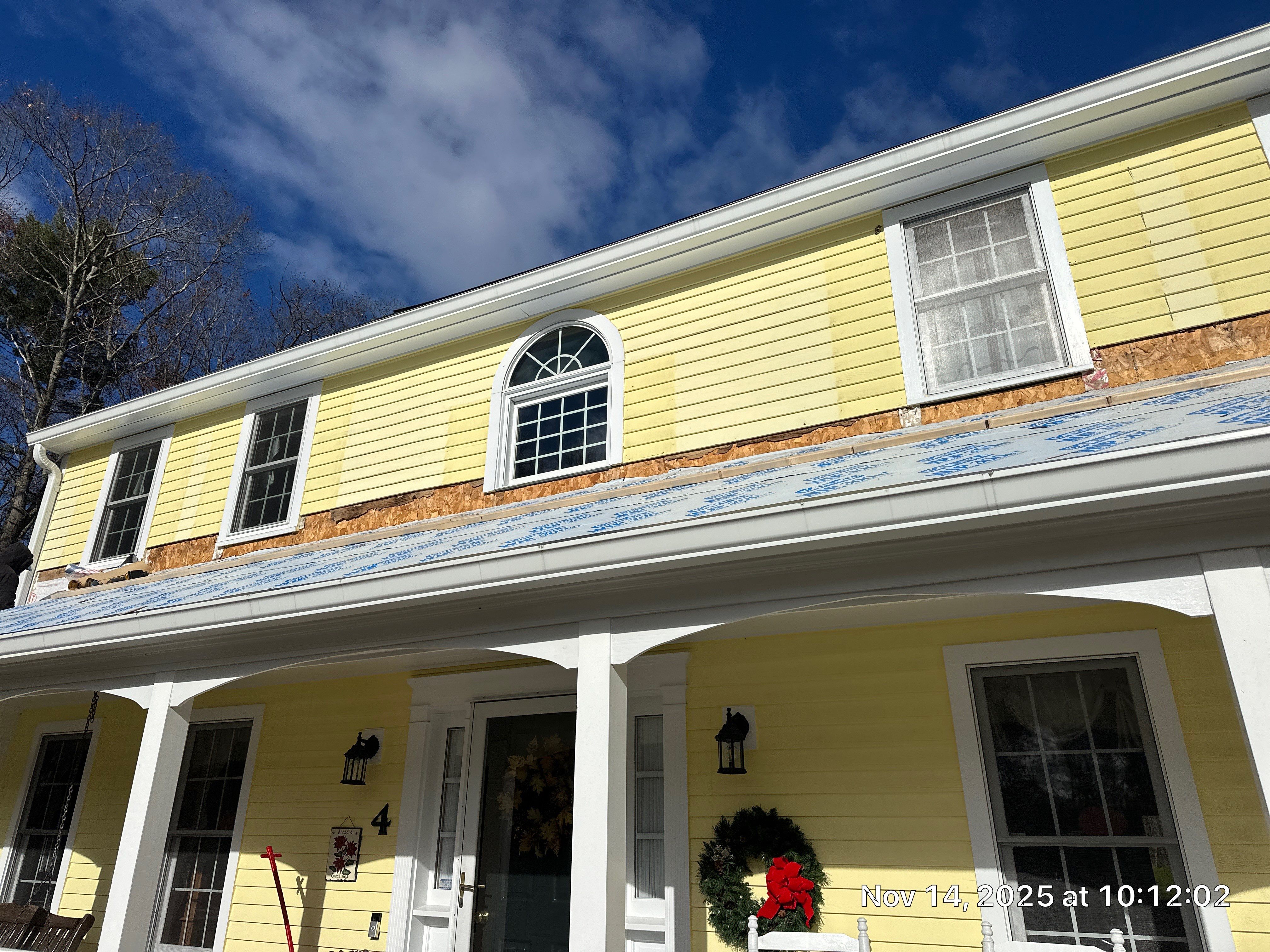 Chelmsford Premium Roof: Onyx Black Shingles with Standing Seam Metal Porch by Mighty Dog Roofing of Greater Middlesex County